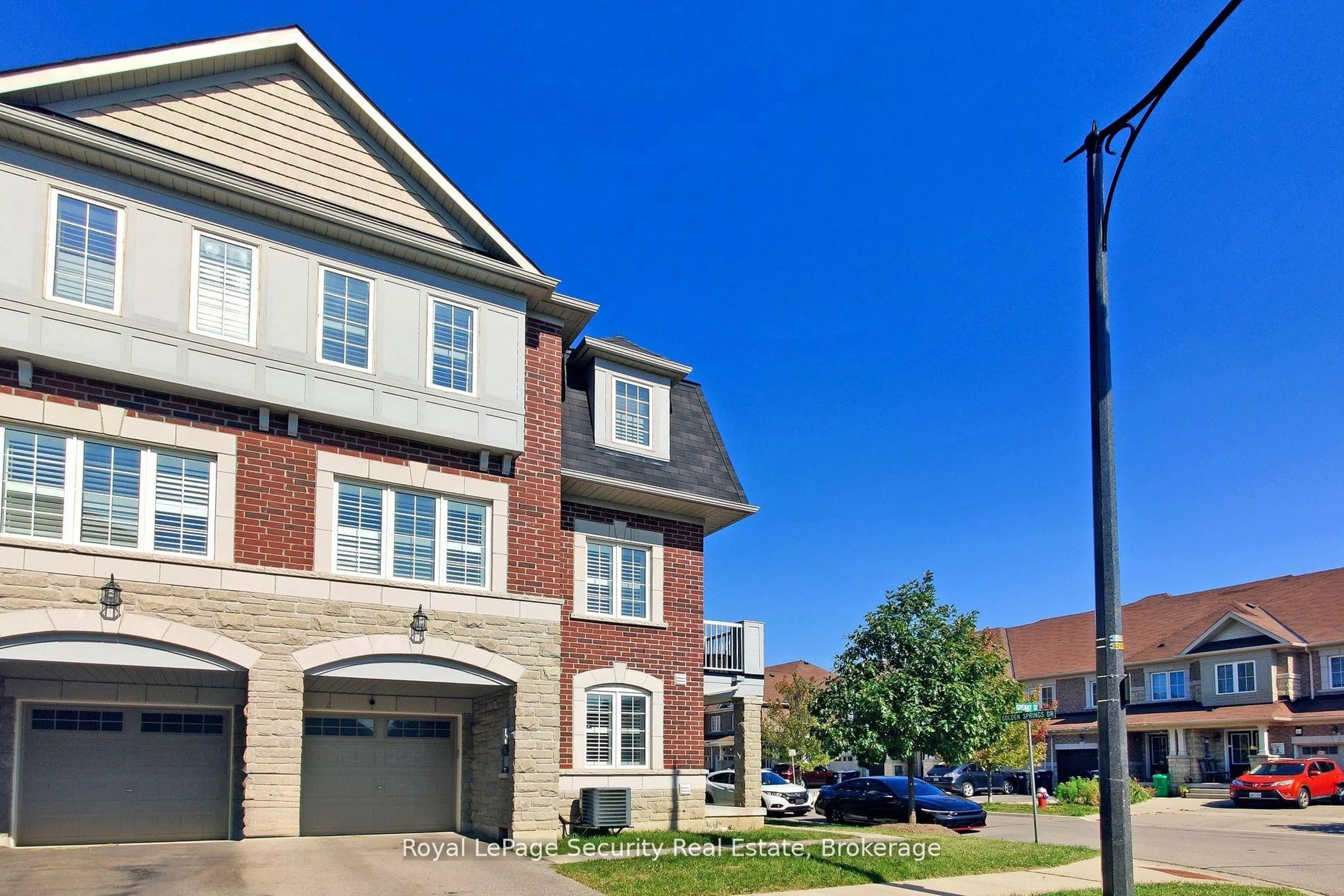 Home with brick exterior material, street for 55 Golden Springs Dr, Brampton Ontario L7A 0C7
