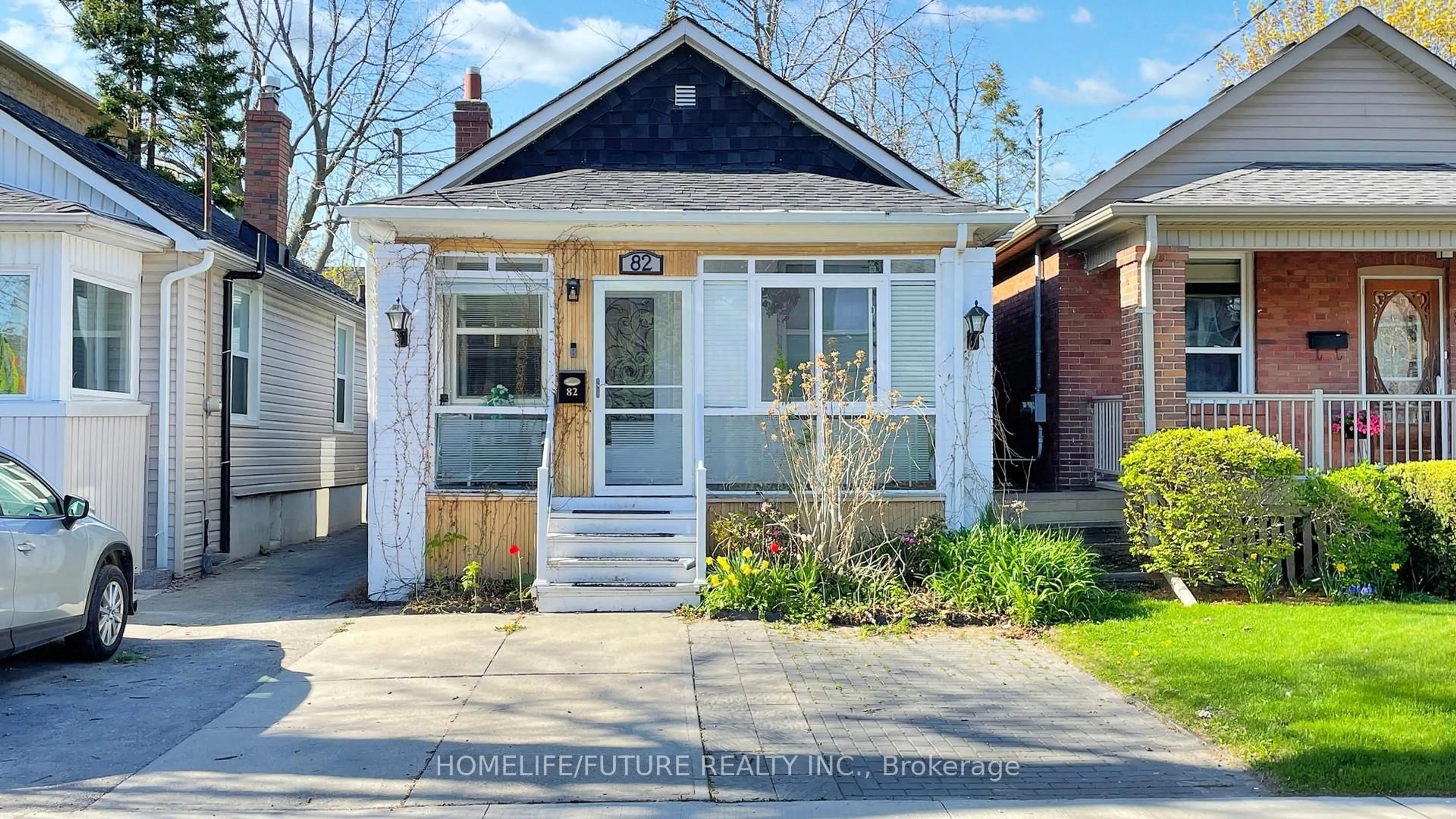 Home with brick exterior material, street for 82 Heman St, Toronto Ontario M8V 1X5