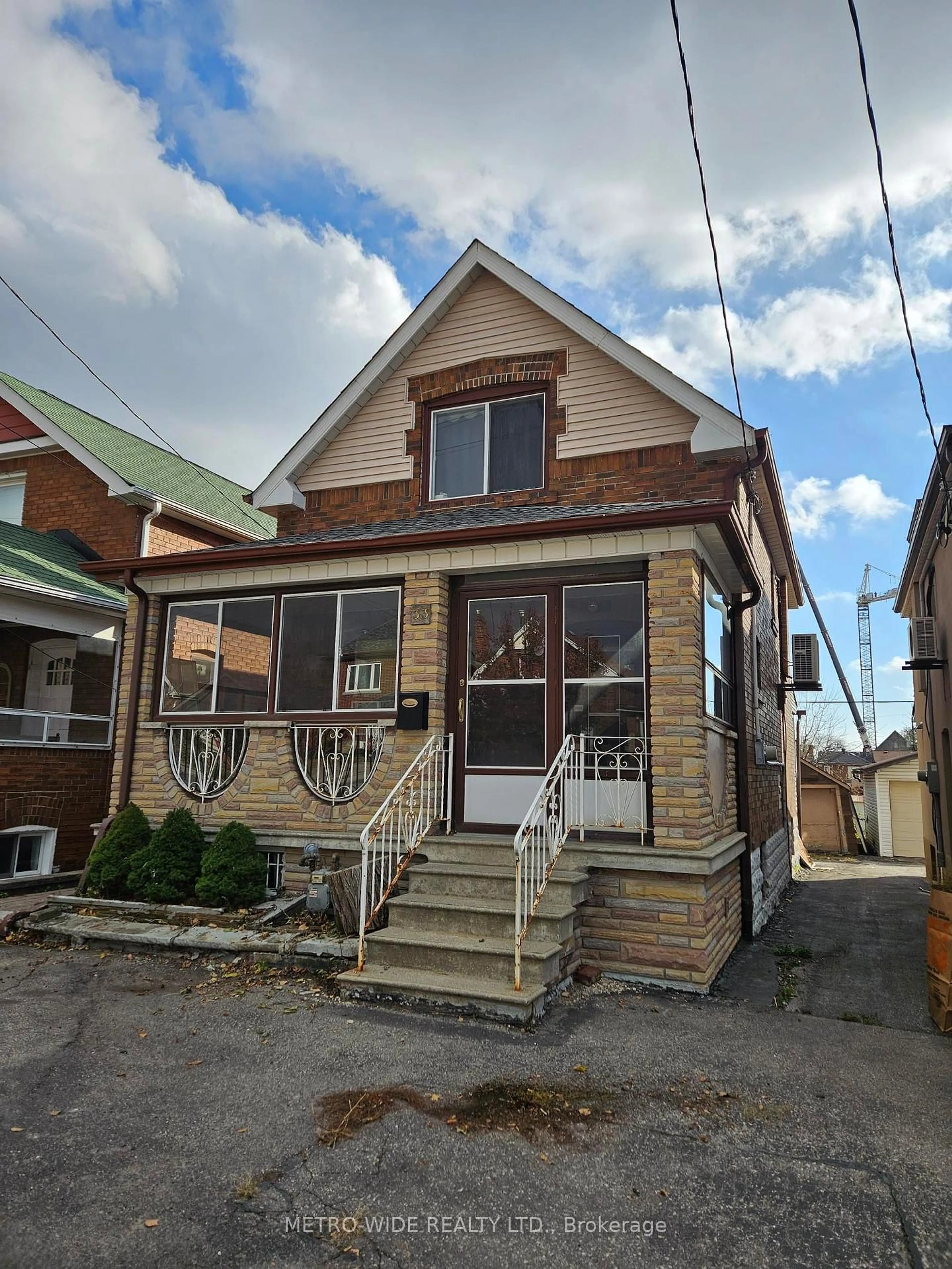 Home with brick exterior material, street for 33 Bowie Ave, Toronto Ontario M6E 2P2