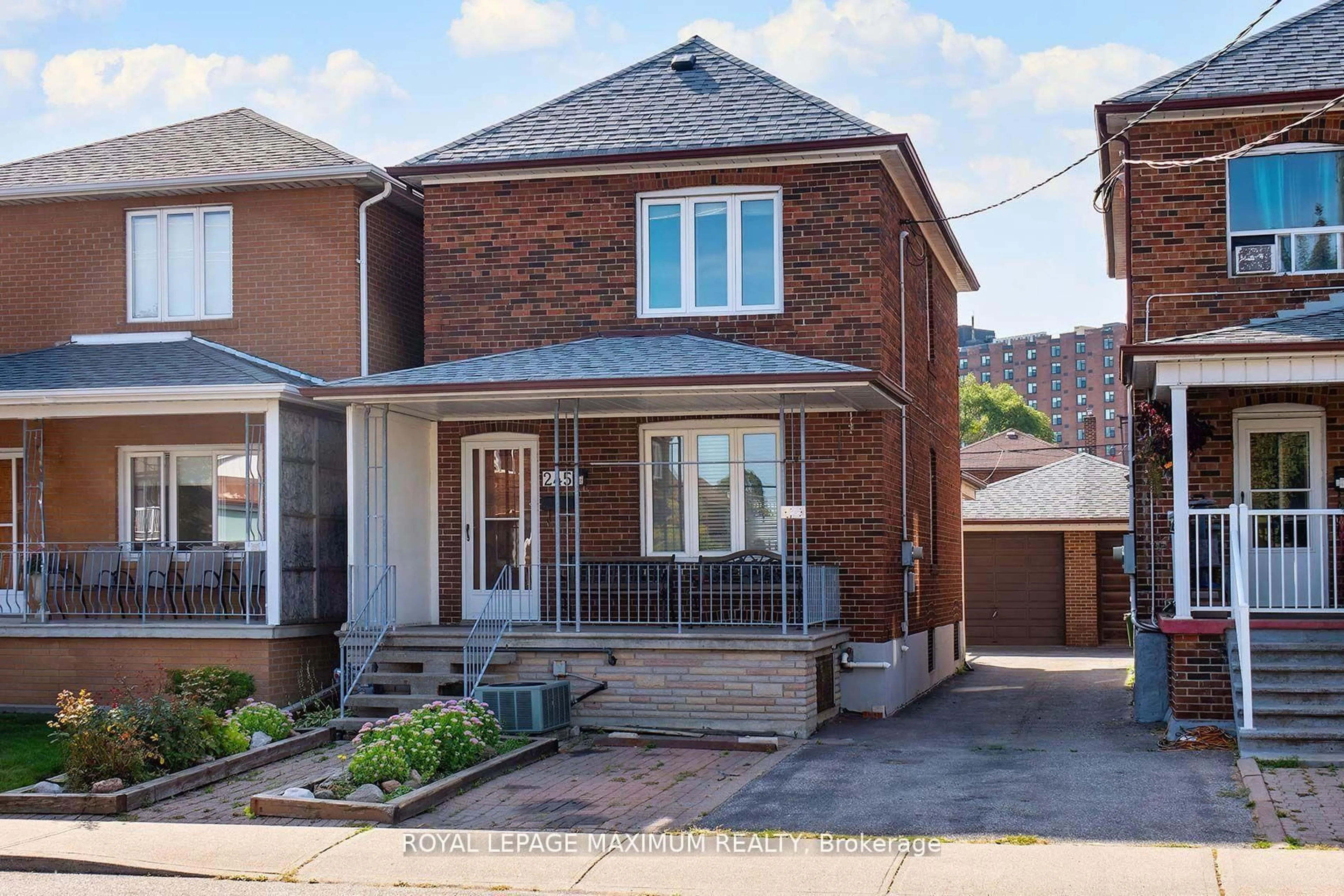 Home with brick exterior material, street for 245 Belgravia Ave, Toronto Ontario M6E 2M9