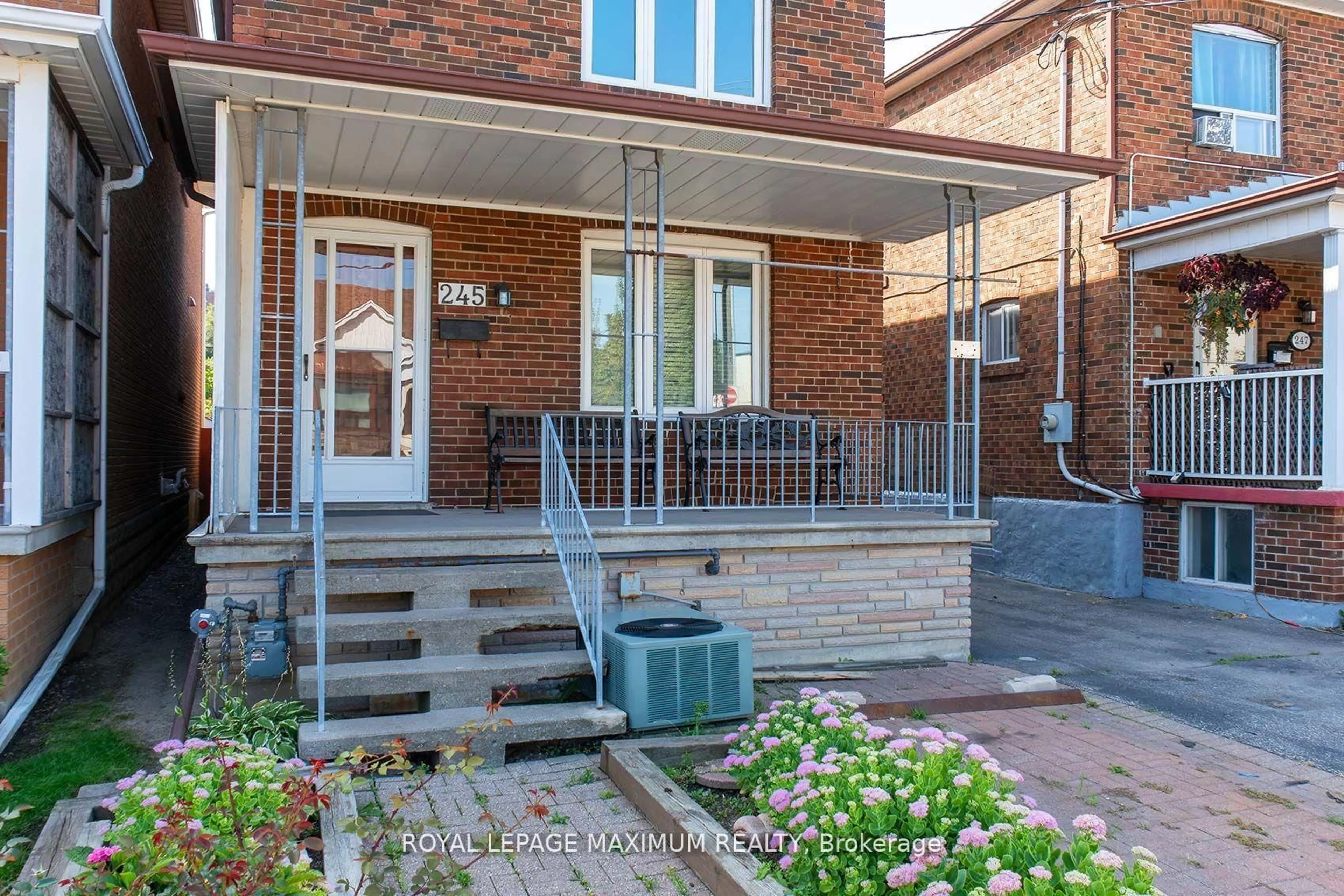 Home with brick exterior material, street for 245 Belgravia Ave, Toronto Ontario M6E 2M9
