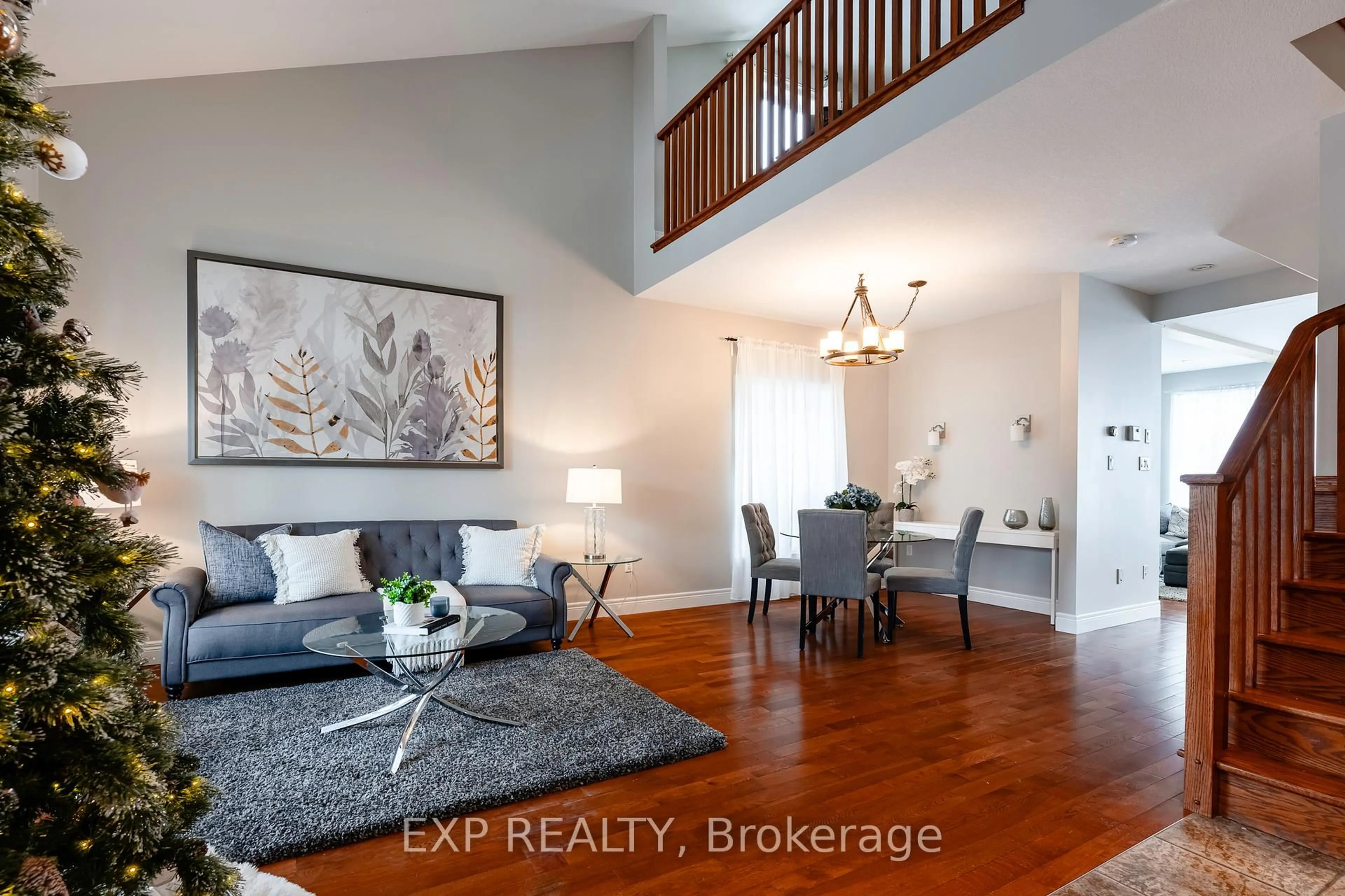 Living room with furniture, wood/laminate floor for 65 Buena Vista Dr, Orangeville Ontario L9W 5K8