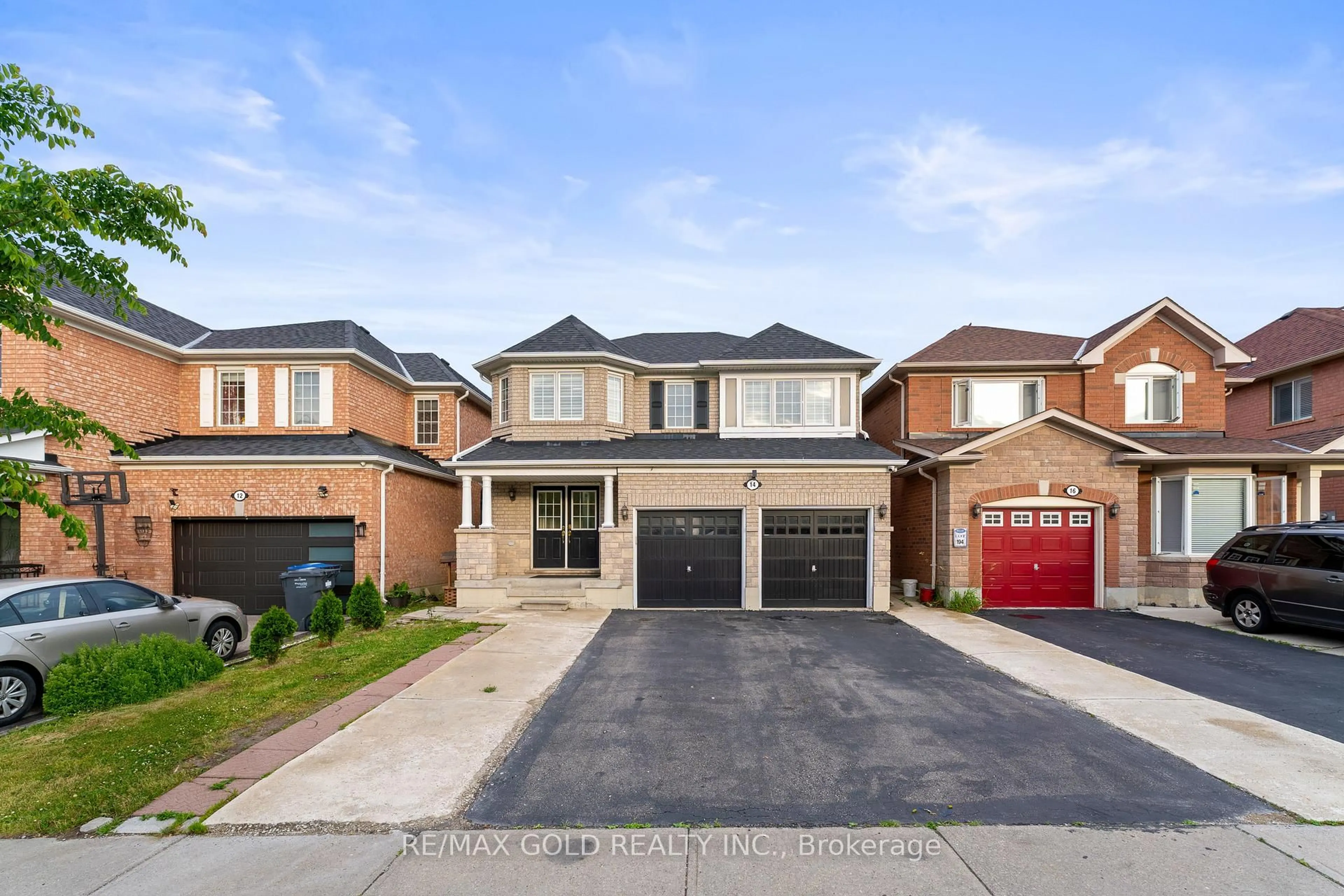 Home with brick exterior material, street for 14 Gaspe Rd, Brampton Ontario L6S 0A4