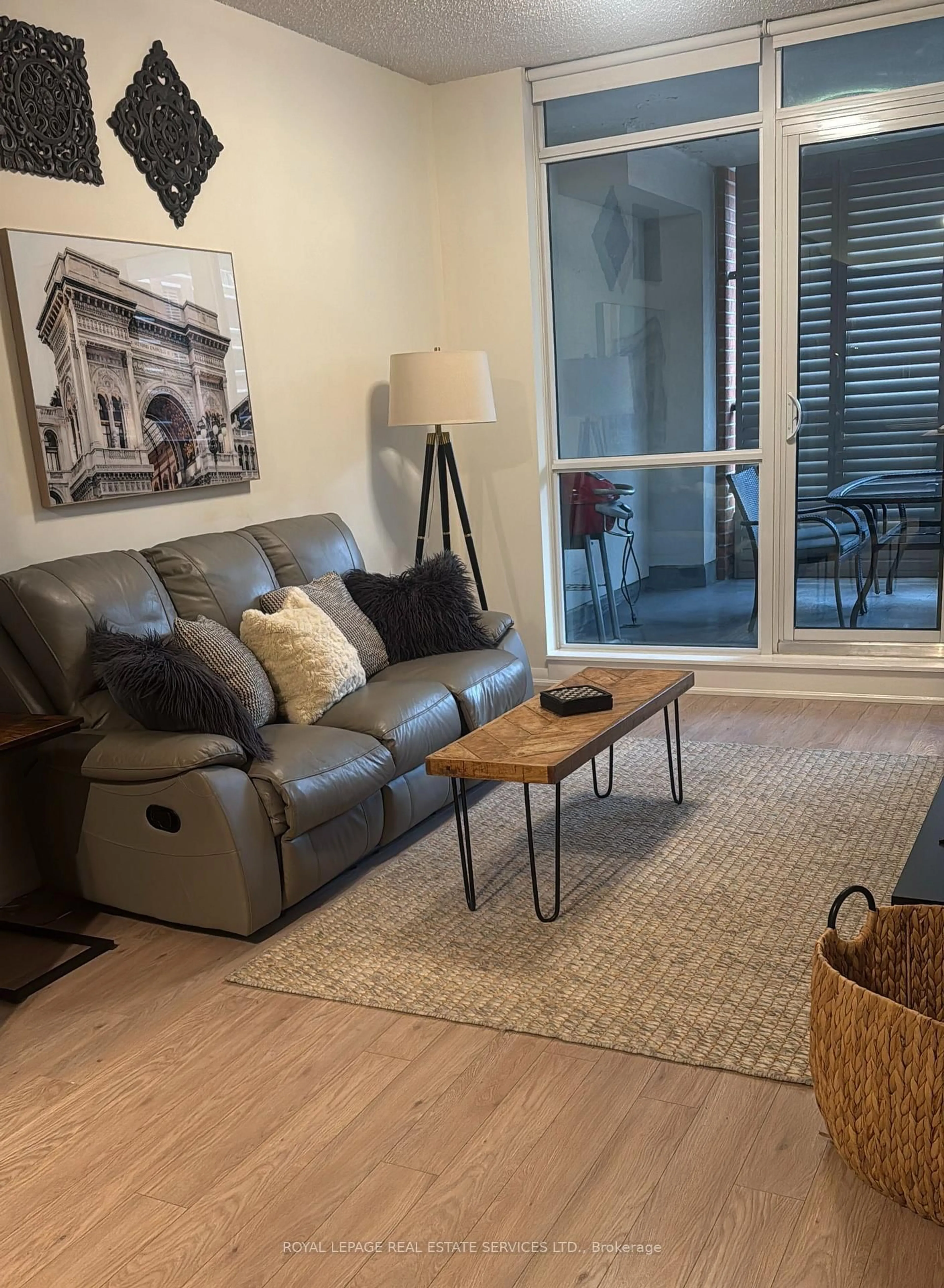 Living room with furniture, wood/laminate floor for 800 Lawrence Ave #619, Toronto Ontario M6A 0B1