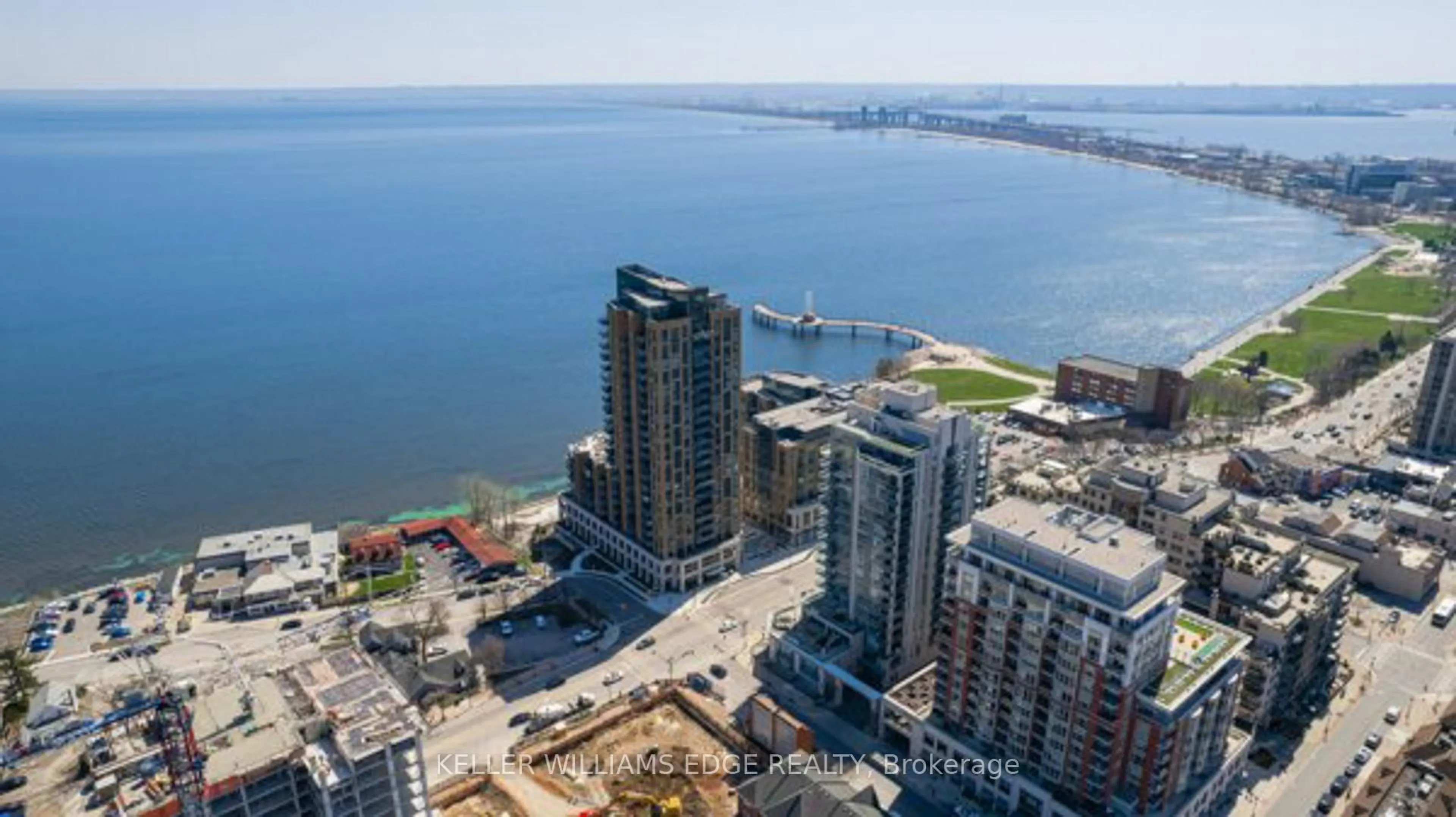 A pic from outside/outdoor area/front of a property/back of a property/a pic from drone, water/lake/river/ocean view for 2060 Lakeshore Rd #411, Burlington Ontario L7R 0G2
