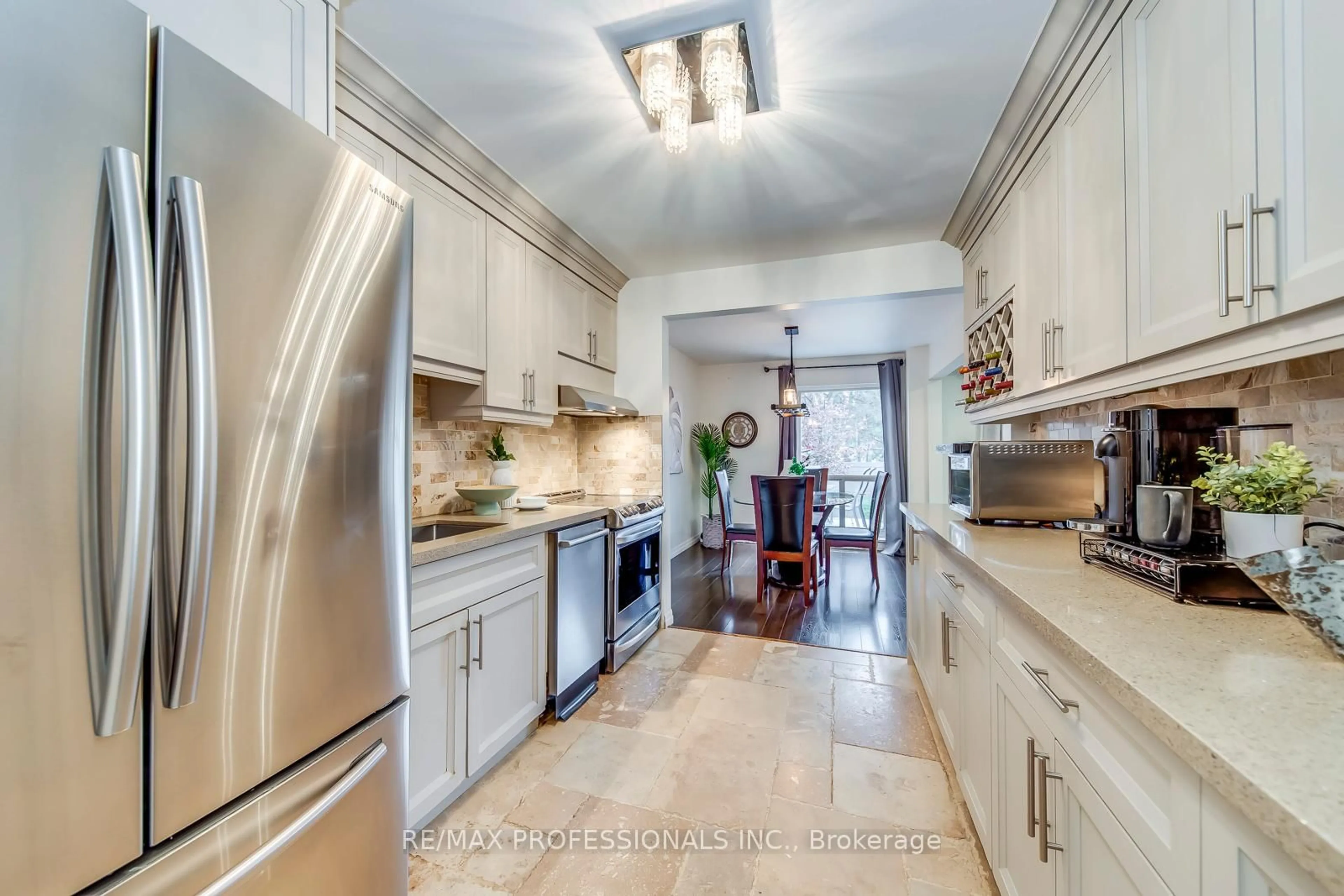 Open concept kitchen, ceramic/tile floor for 4345 Bloor St #51, Toronto Ontario M9C 2A4