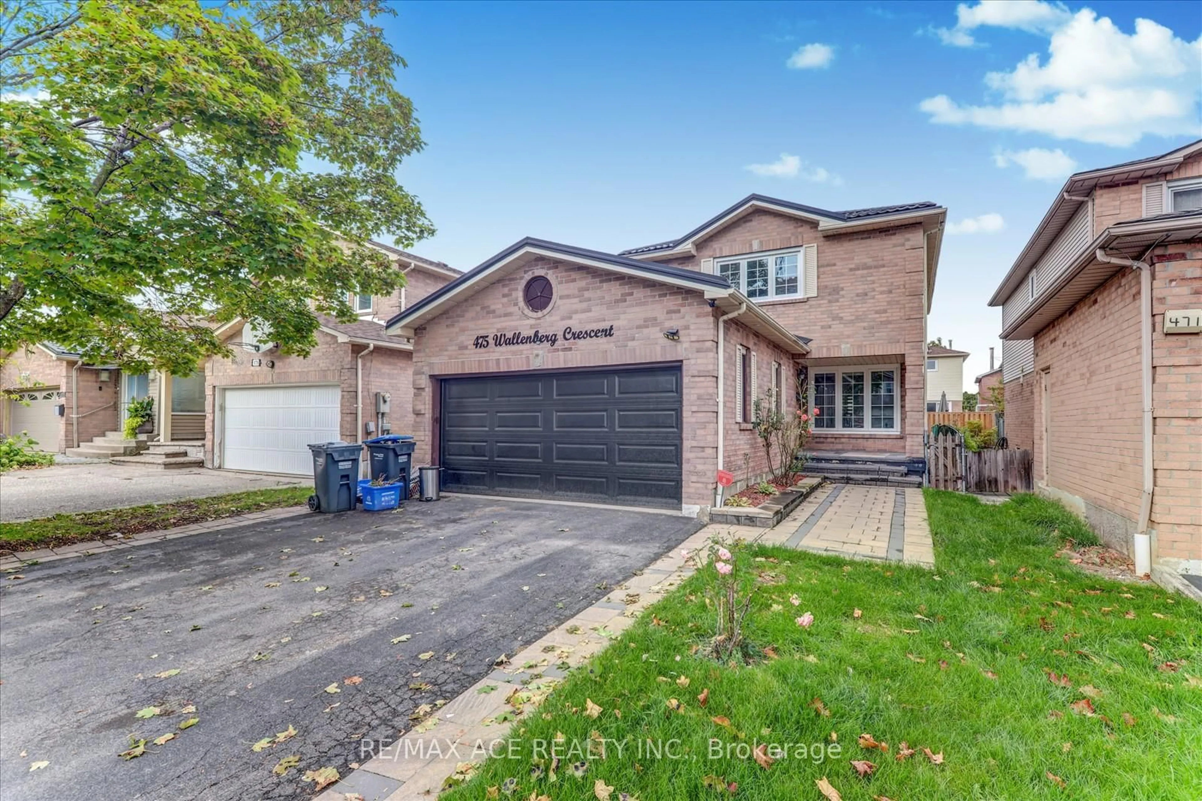Home with brick exterior material, street for 475 Wallenberg Cres, Mississauga Ontario L5B 3M2