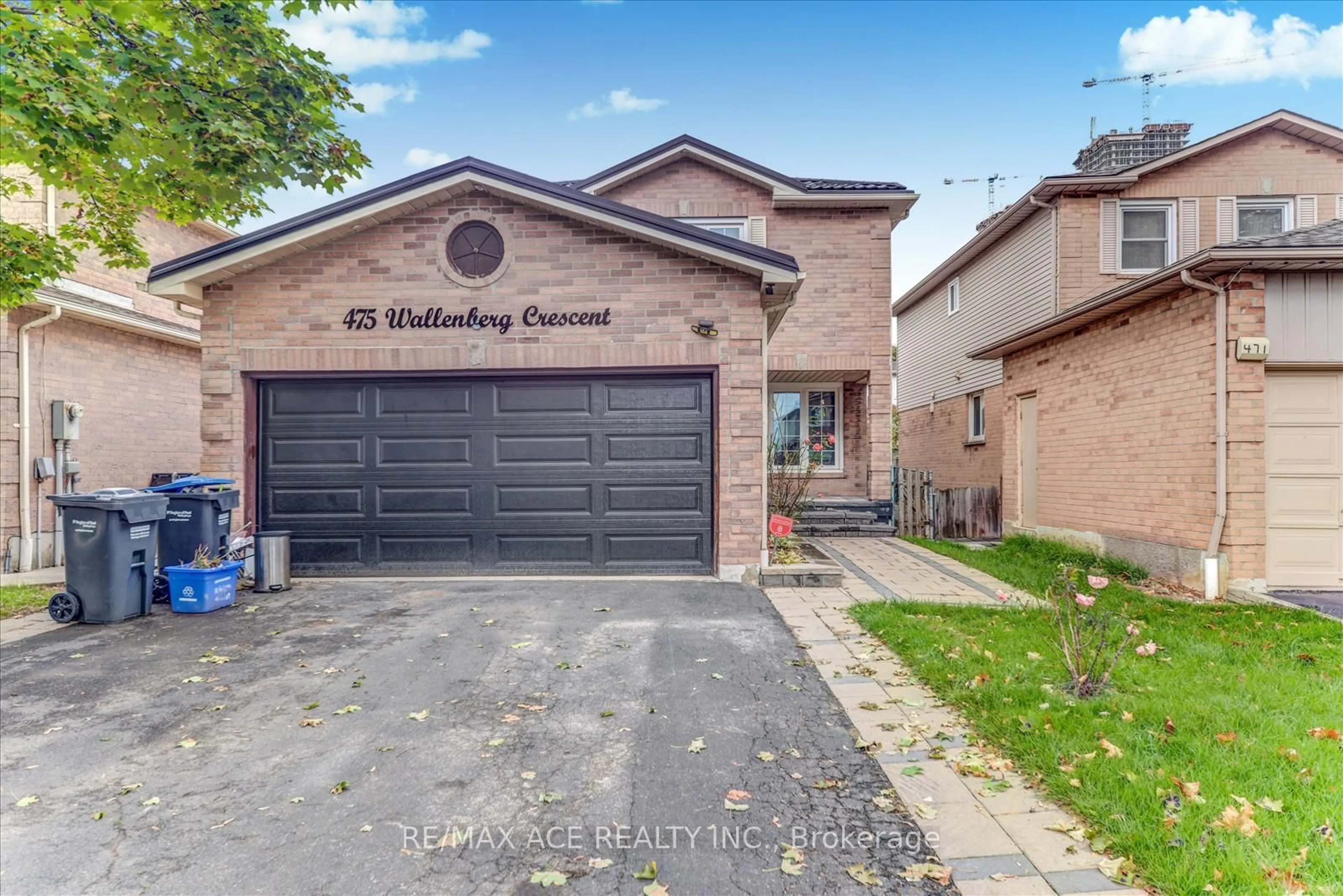 Home with brick exterior material, street for 475 Wallenberg Cres, Mississauga Ontario L5B 3M2