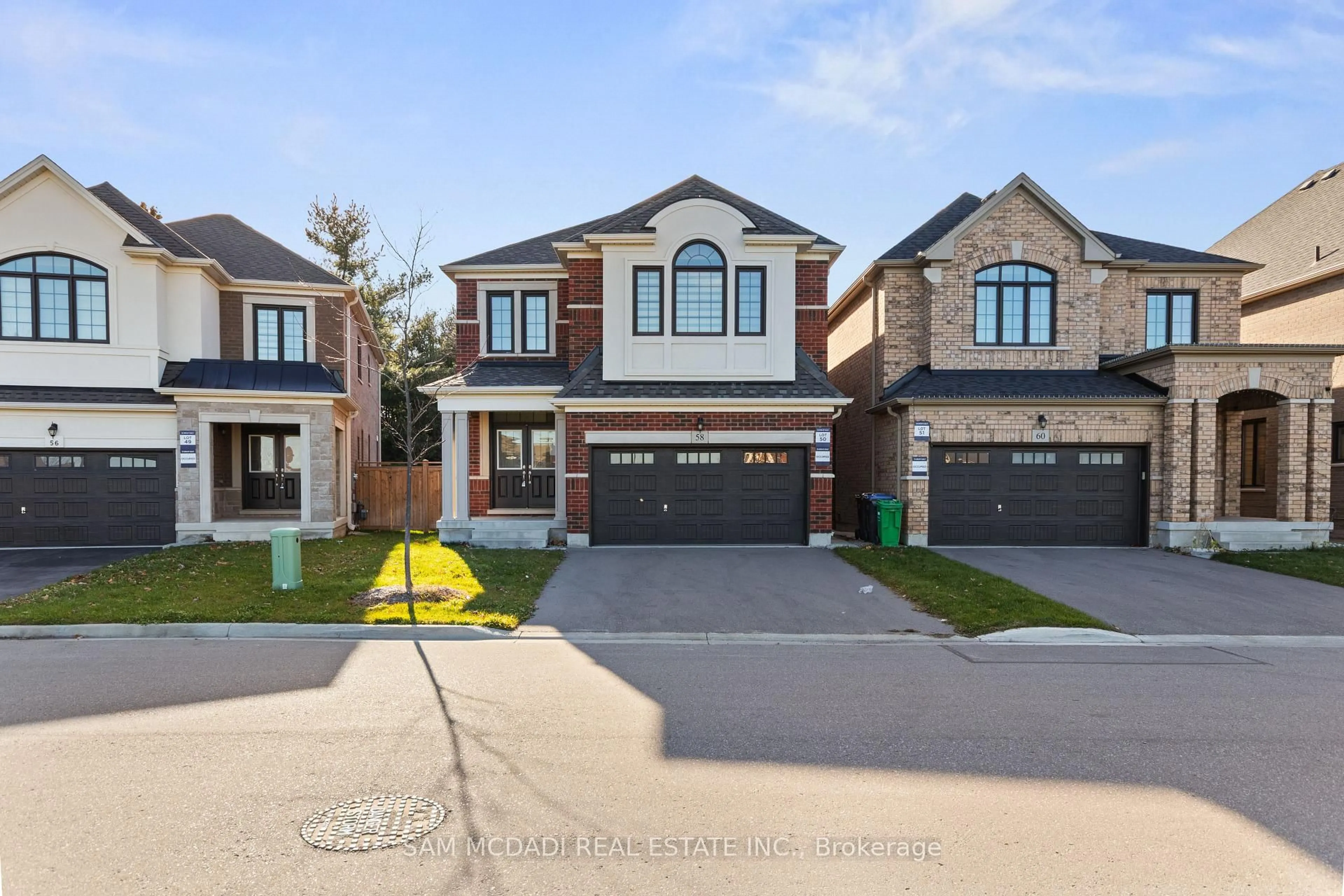 Home with brick exterior material, street for 58 Workgreen Park Way, Brampton Ontario L6Y 6J7