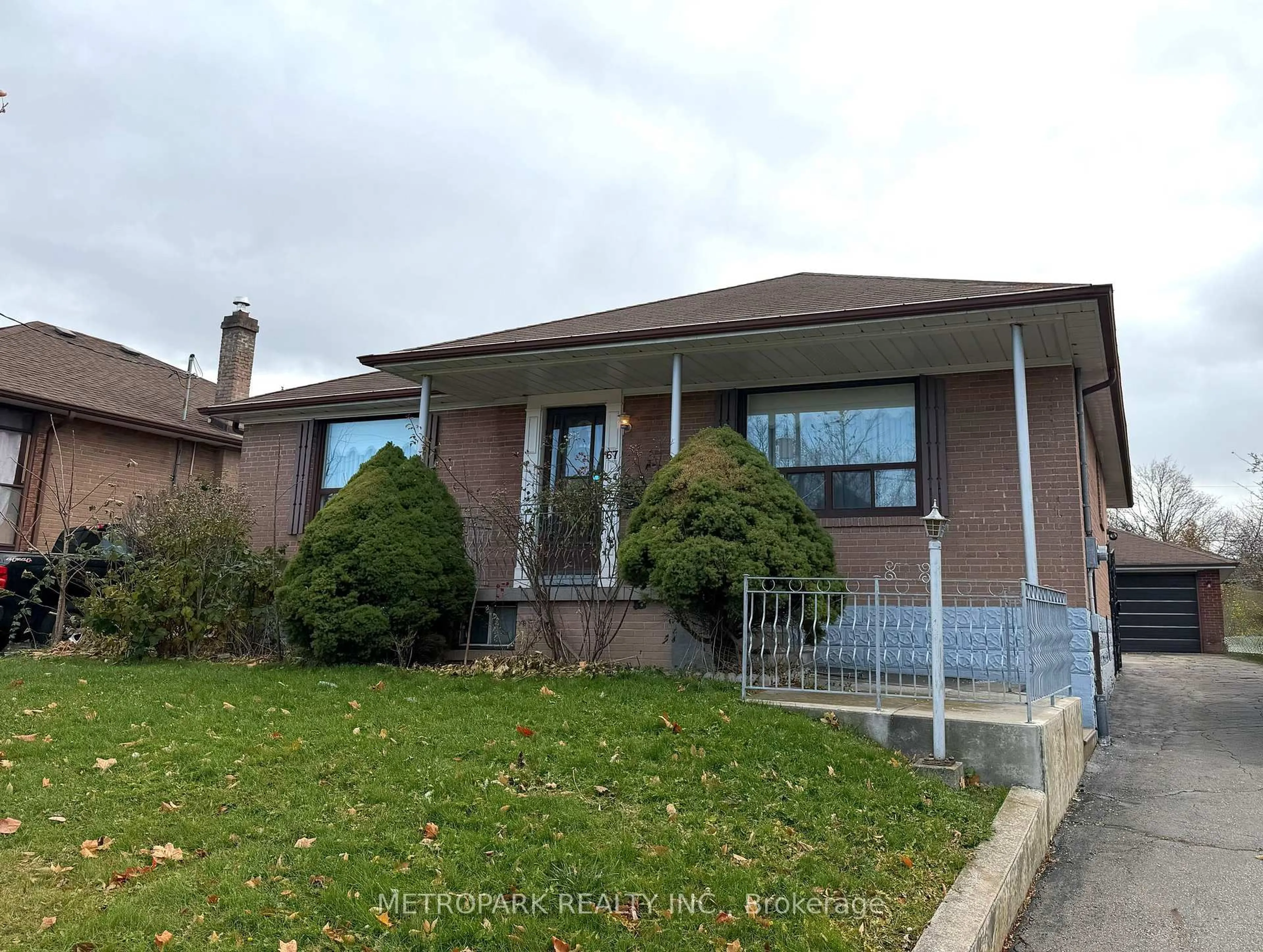Home with brick exterior material, street for 67 William Cragg Dr, Toronto Ontario M3M 1V3