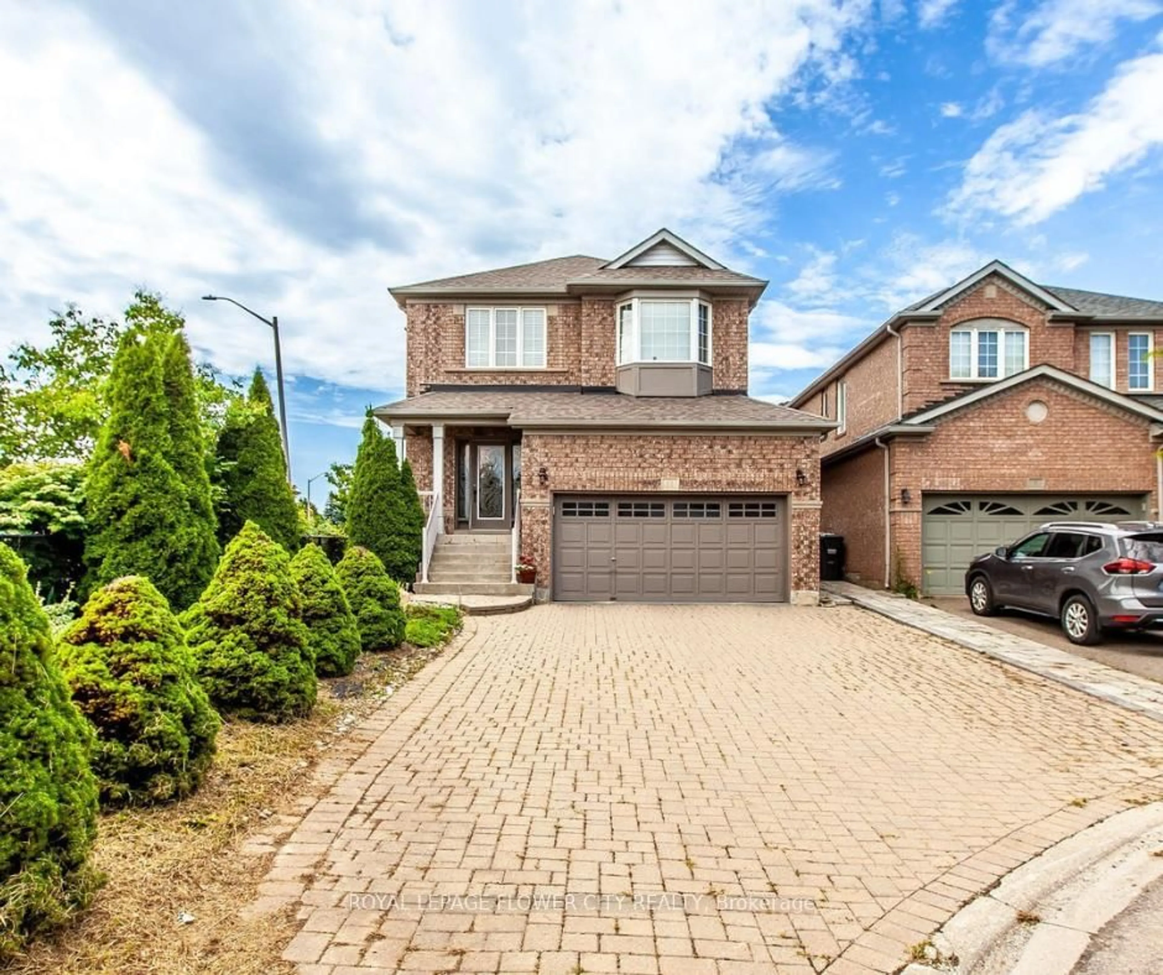 Home with brick exterior material, street for 11 Oak Gardens Crt, Brampton Ontario L6S 0E2