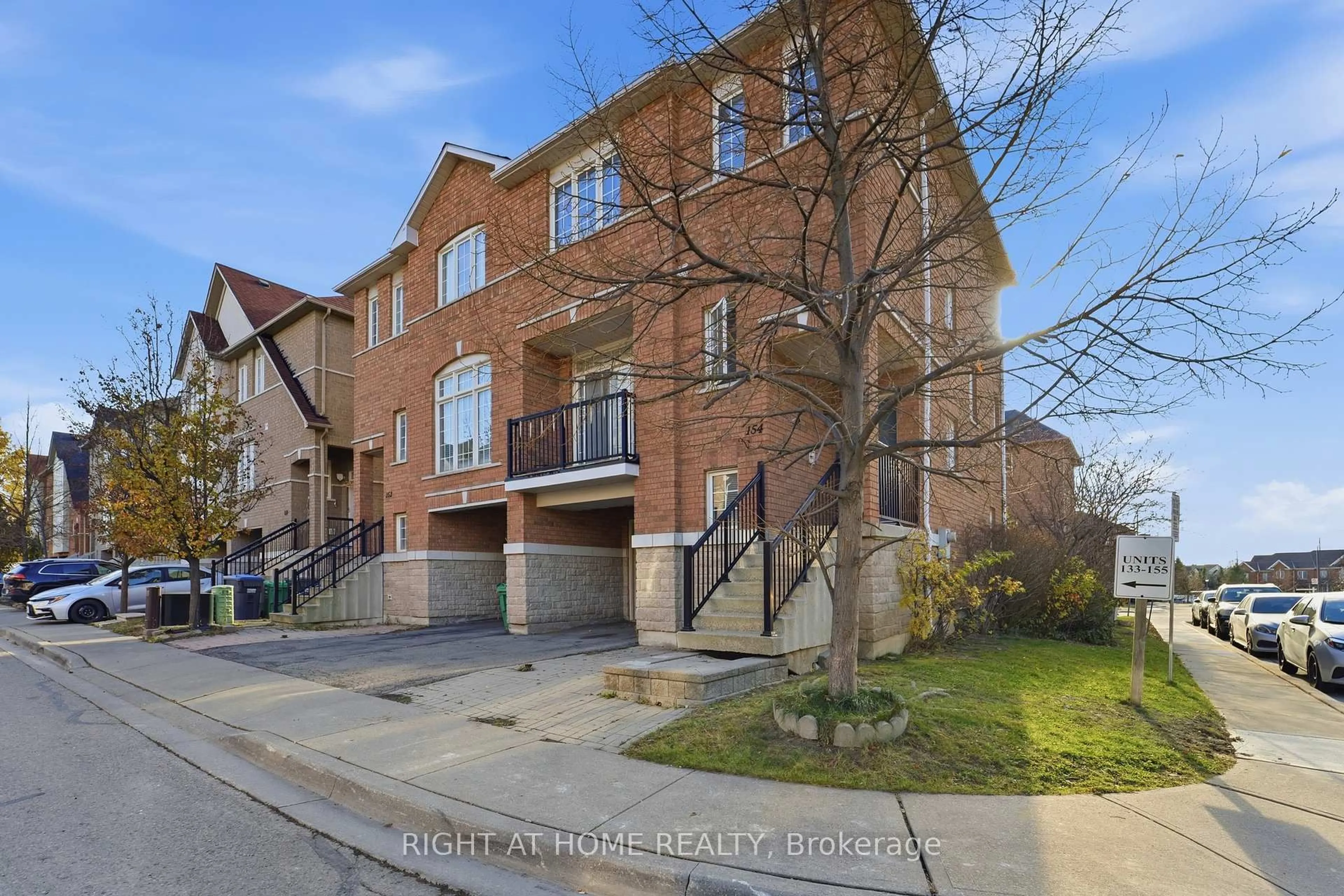 Home with brick exterior material, street for 7155 Magistrate Terr #154, Mississauga Ontario L5W 1Y9
