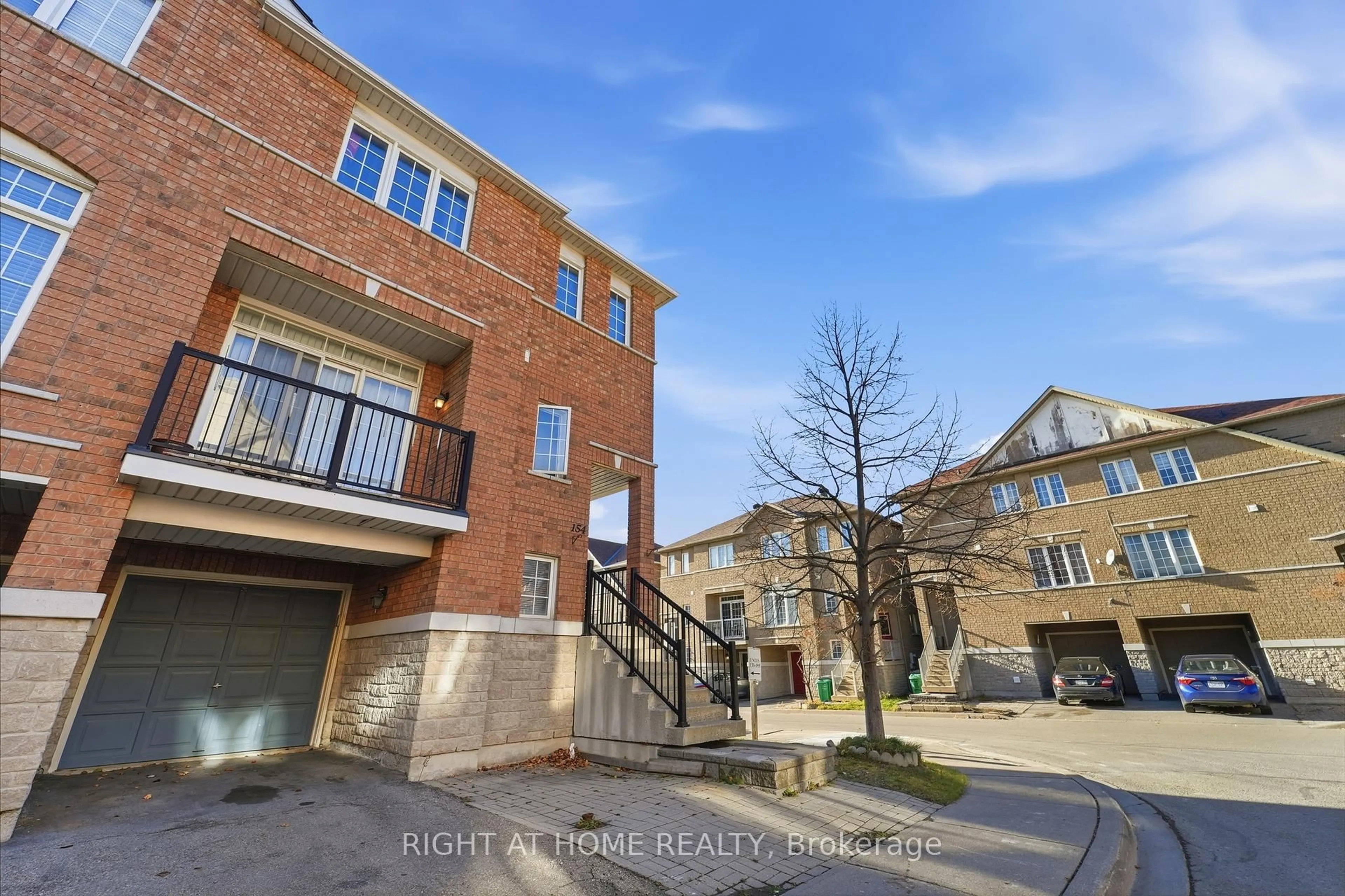 A pic from outside/outdoor area/front of a property/back of a property/a pic from drone, street for 7155 Magistrate Terr #154, Mississauga Ontario L5W 1Y9