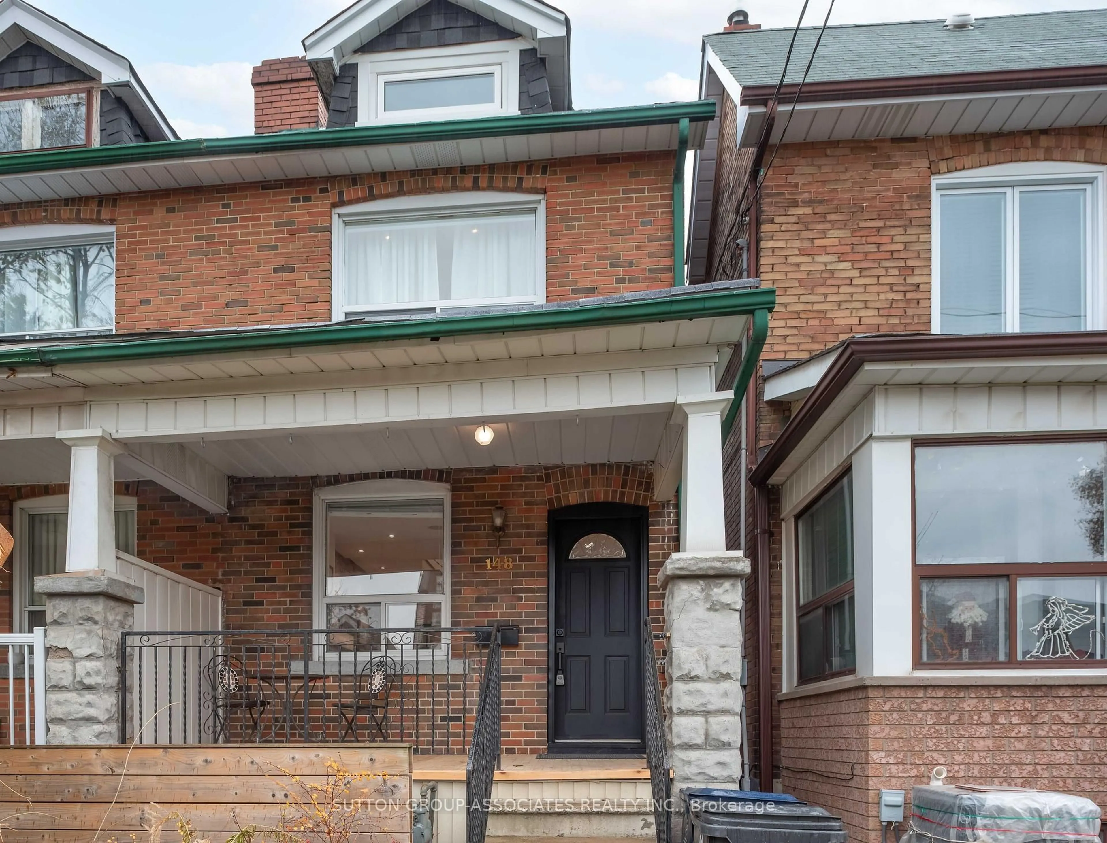 Home with brick exterior material, street for 148 Boon Ave, Toronto Ontario M6E 3Z5