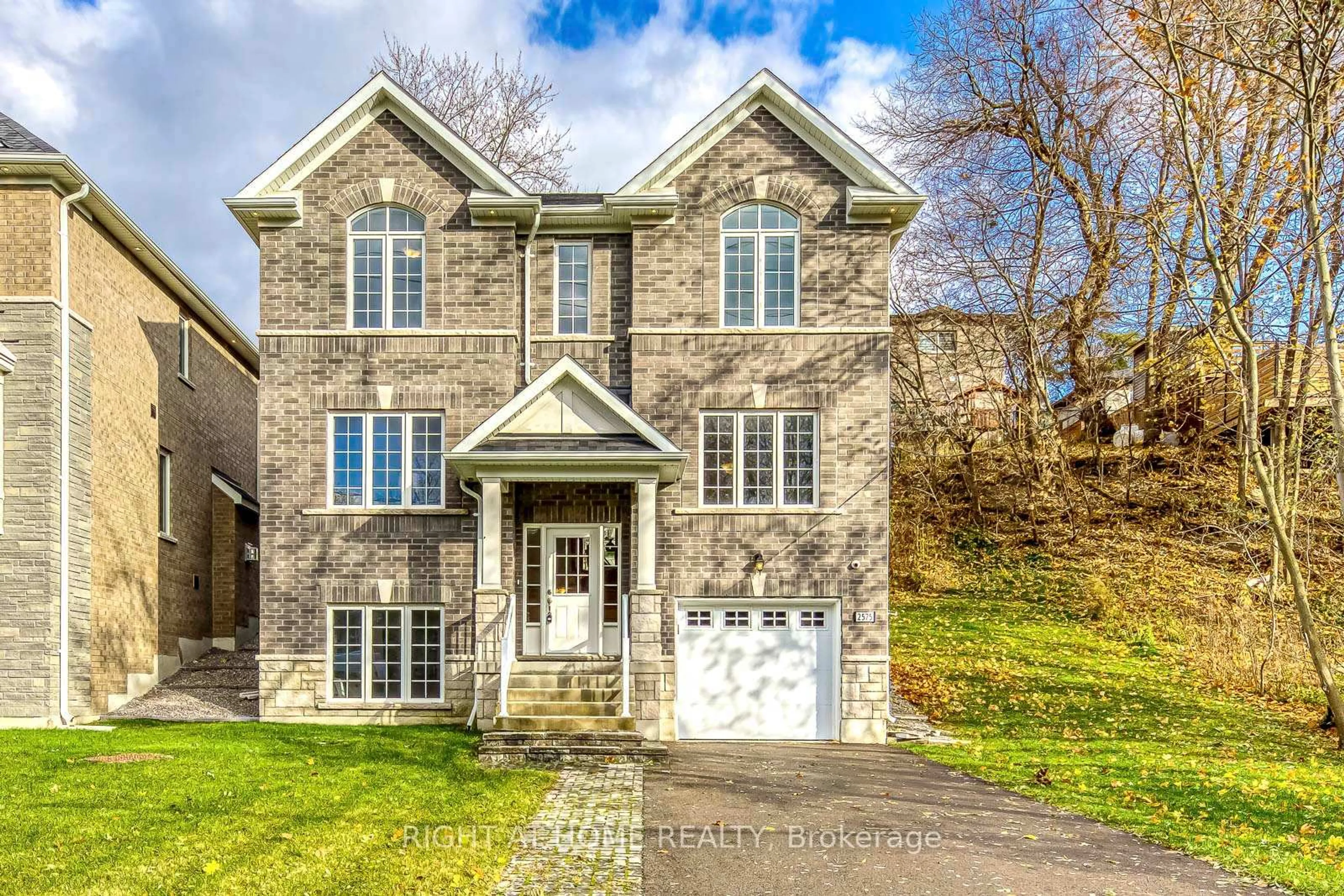 Home with brick exterior material, street for 2575 Islington Ave, Toronto Ontario M9V 4A2