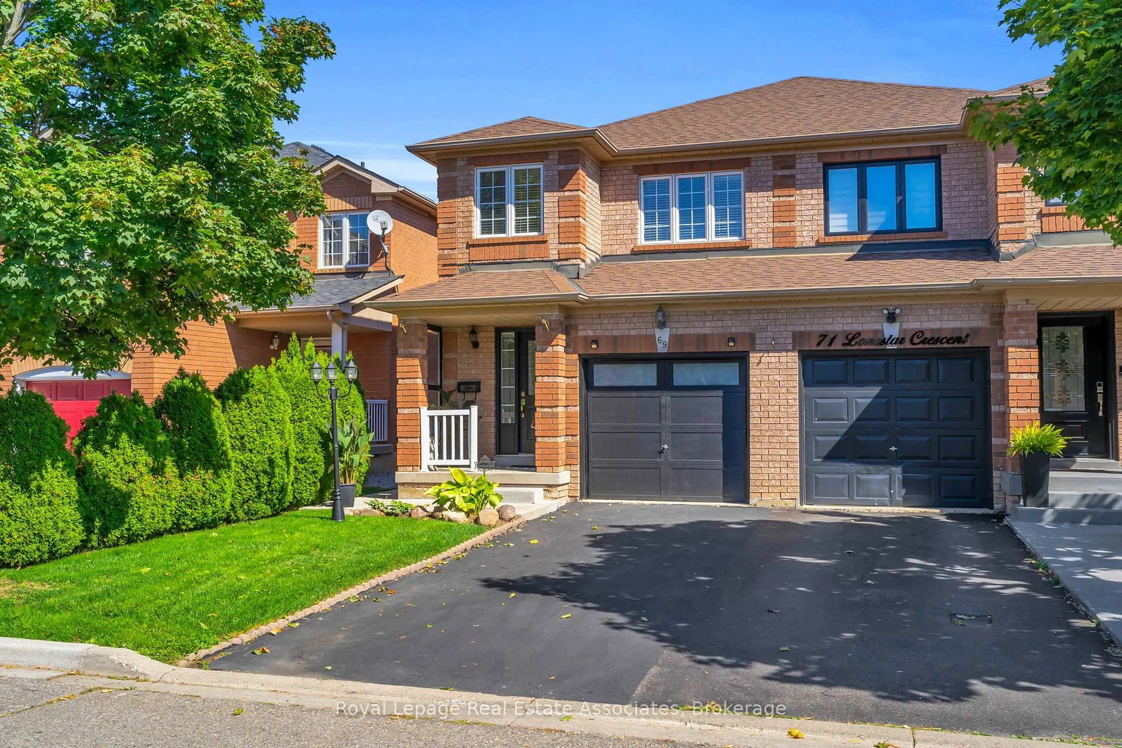 Home with brick exterior material, street for 69 Lonestar Cres, Brampton Ontario L7A 2J1