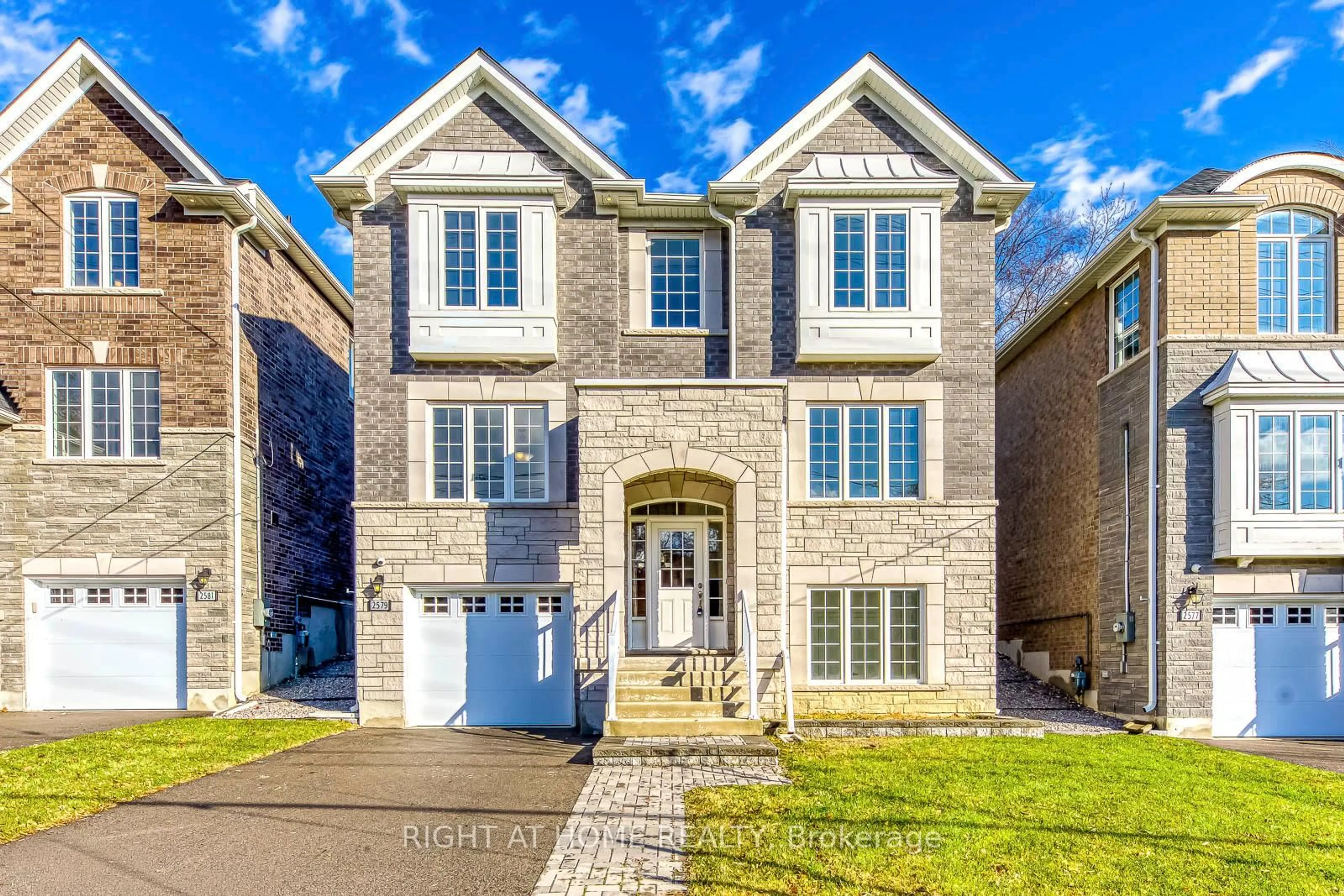 Home with brick exterior material, street for 2579 Islington Ave, Toronto Ontario M9V 4A2