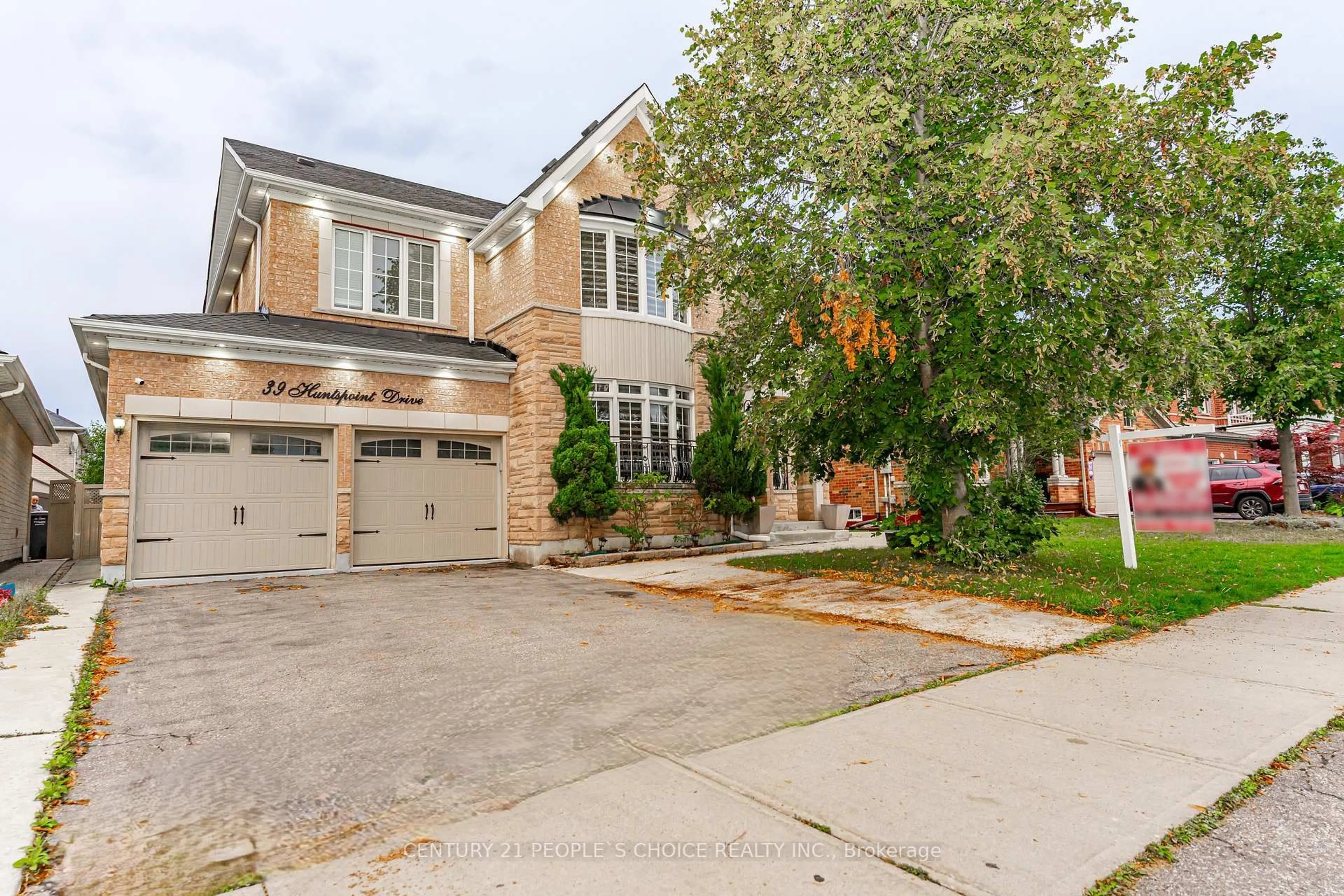 Home with brick exterior material, street for 39 Huntspoint Dr, Brampton Ontario L6P 2E9