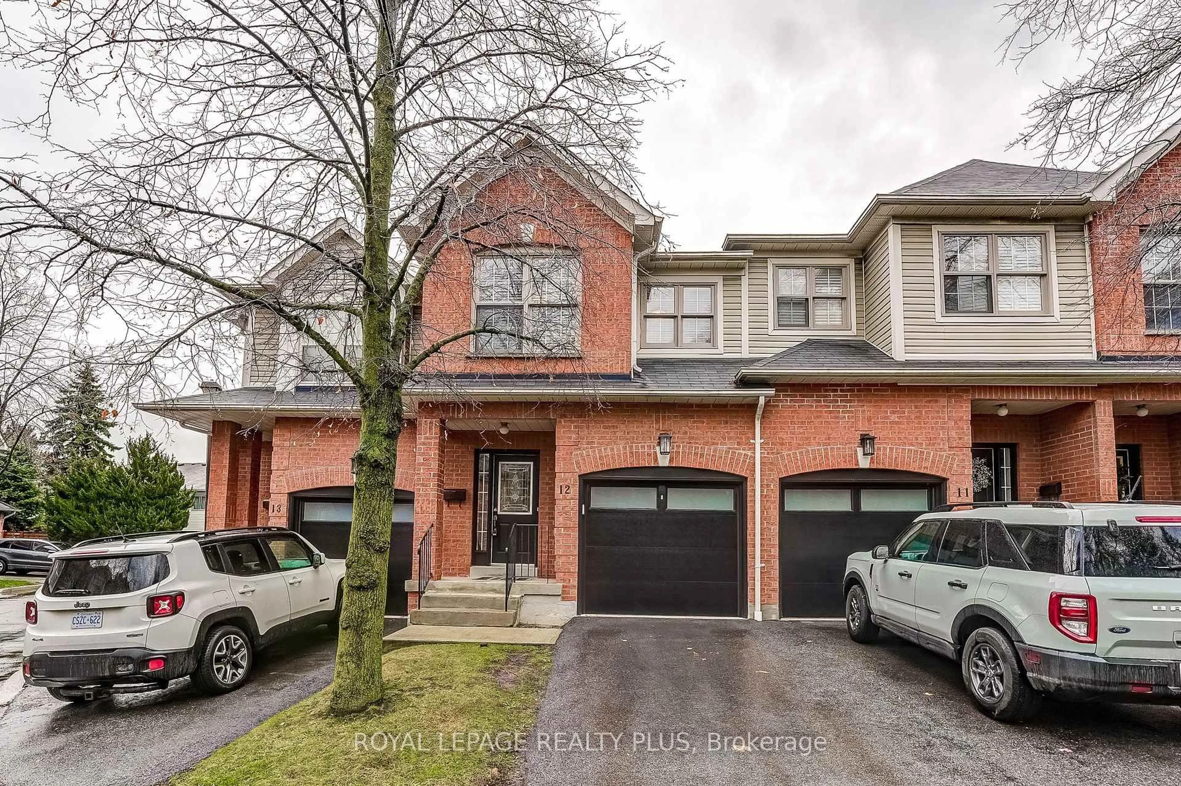 Home with brick exterior material, street for 2385 Fifth Line #12, Mississauga Ontario L5K 1V9