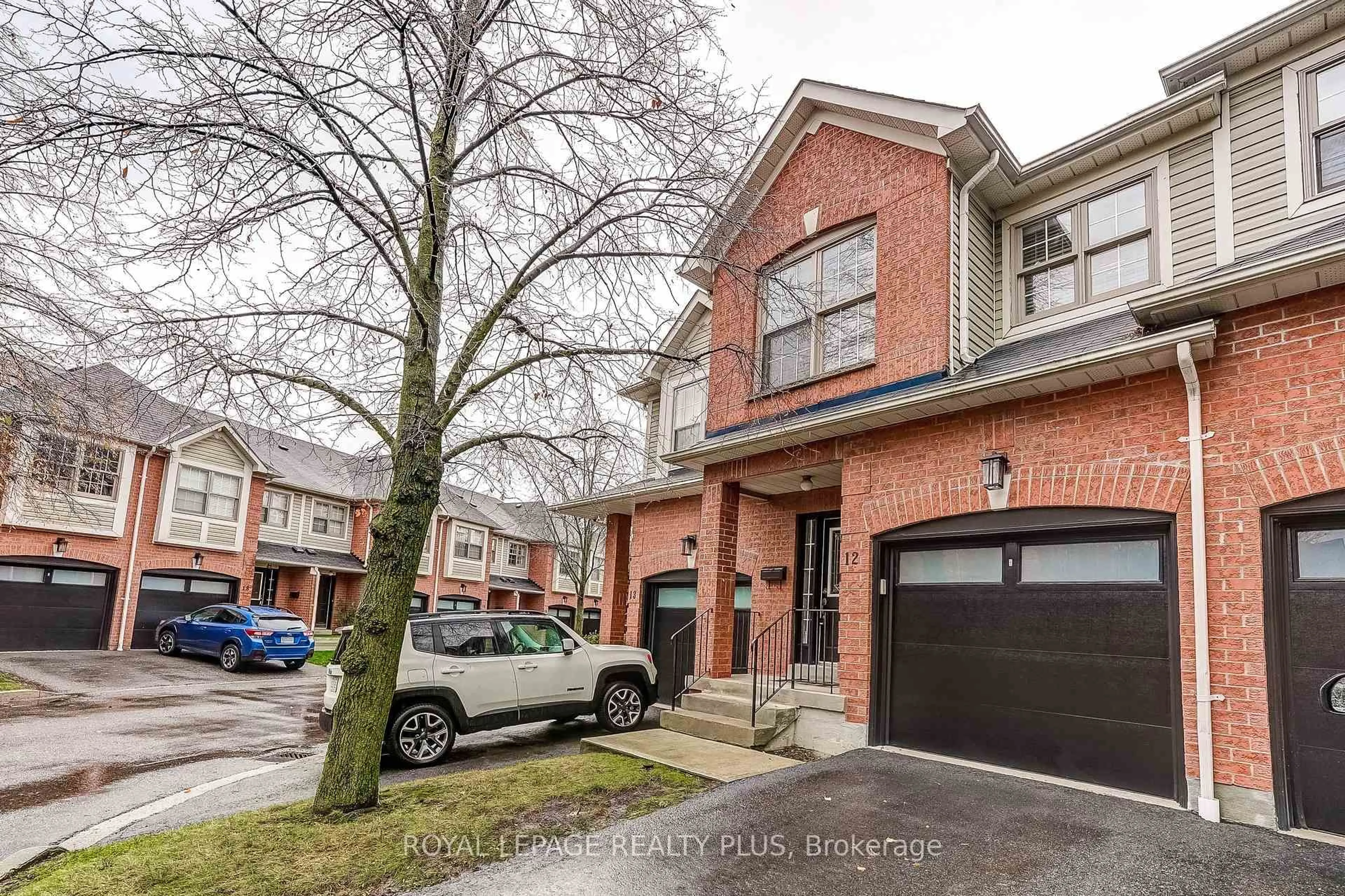 Home with brick exterior material, street for 2385 Fifth Line #12, Mississauga Ontario L5K 1V9