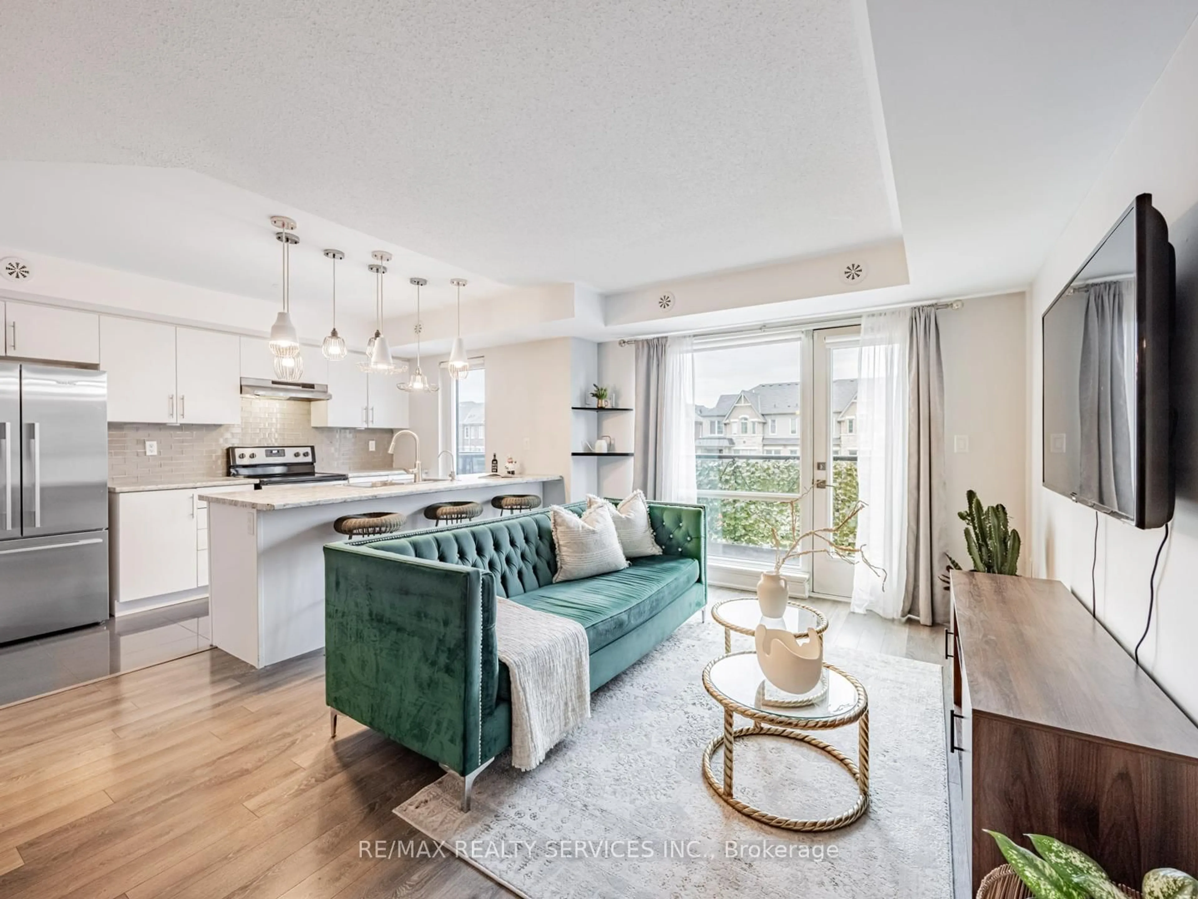 Living room with furniture, unknown for 100 Dufay Rd #60, Brampton Ontario L7A 4S3