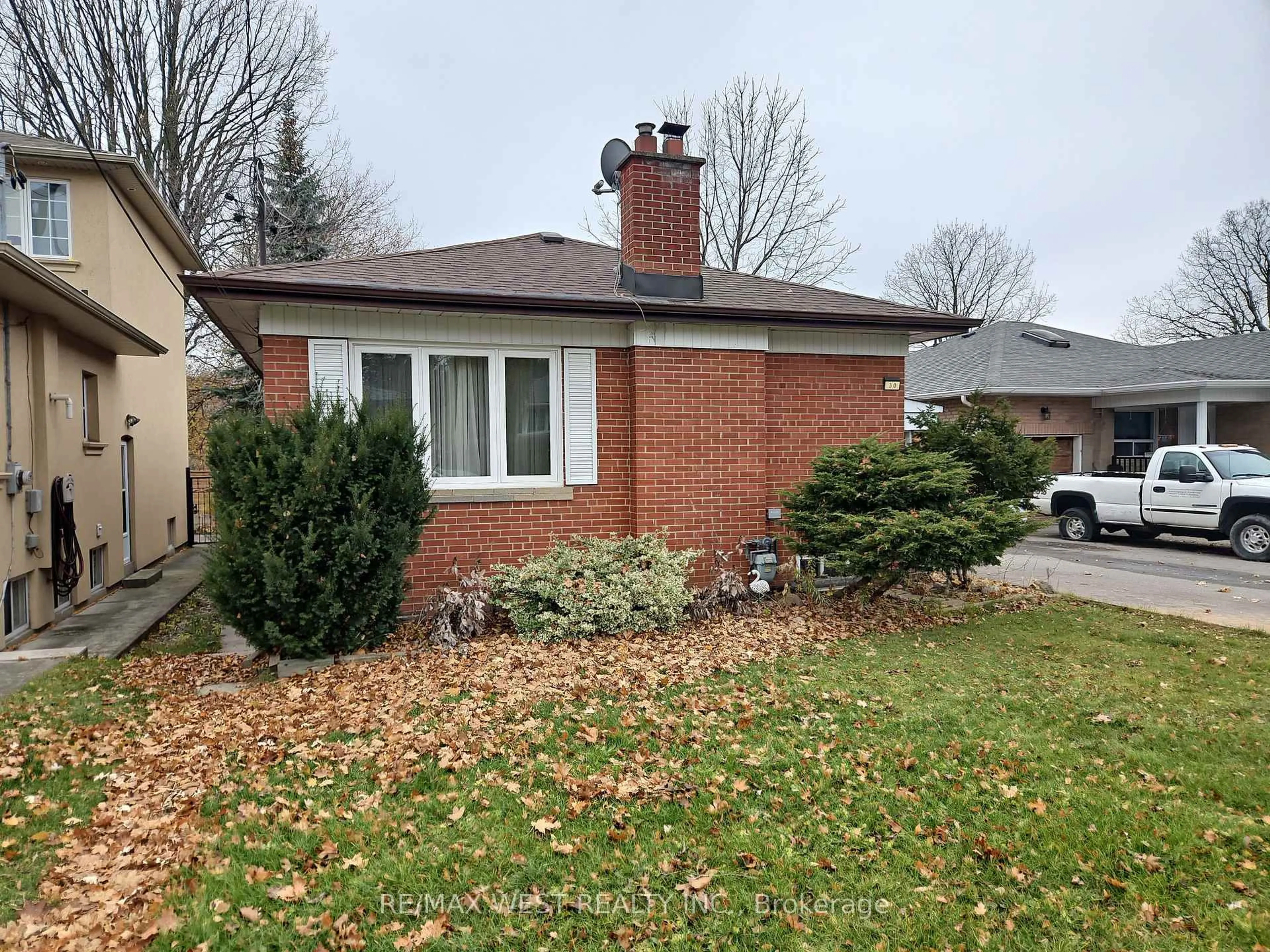 Home with brick exterior material, street for 30 Golfwood Hts, Toronto Ontario M9P 3M1