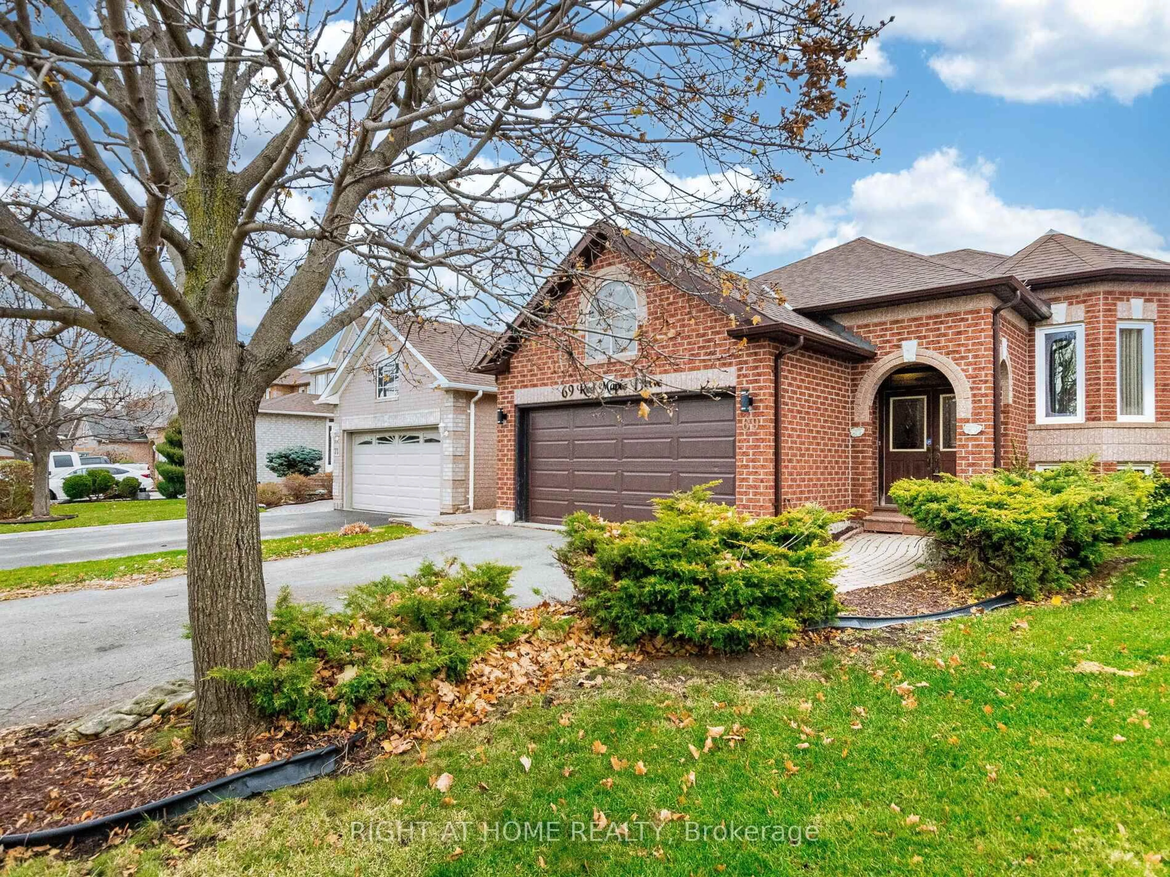 Home with brick exterior material, street for 69 Red Maple Dr, Brampton Ontario L6X 4M1