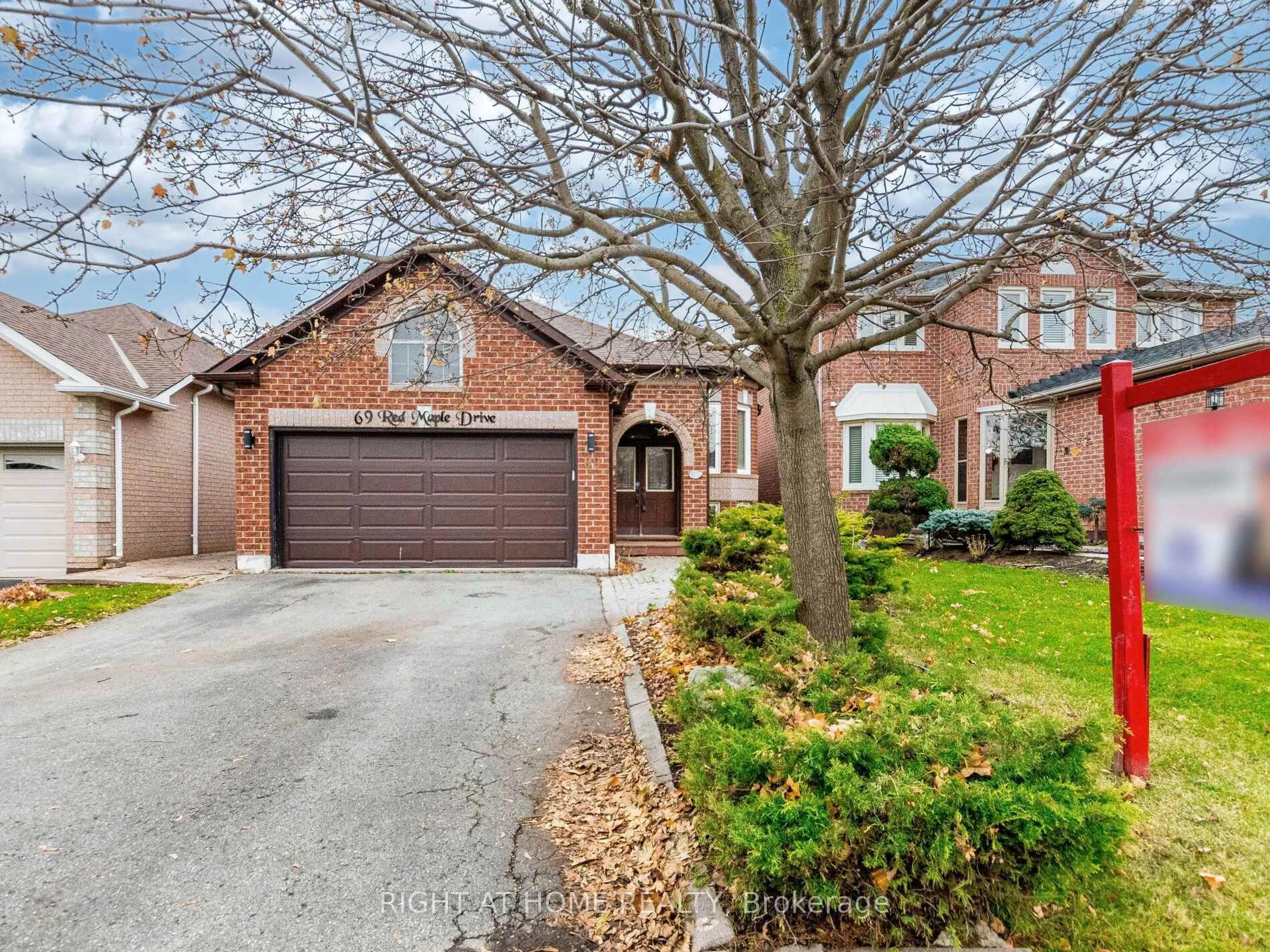 Home with brick exterior material, street for 69 Red Maple Dr, Brampton Ontario L6X 4M1