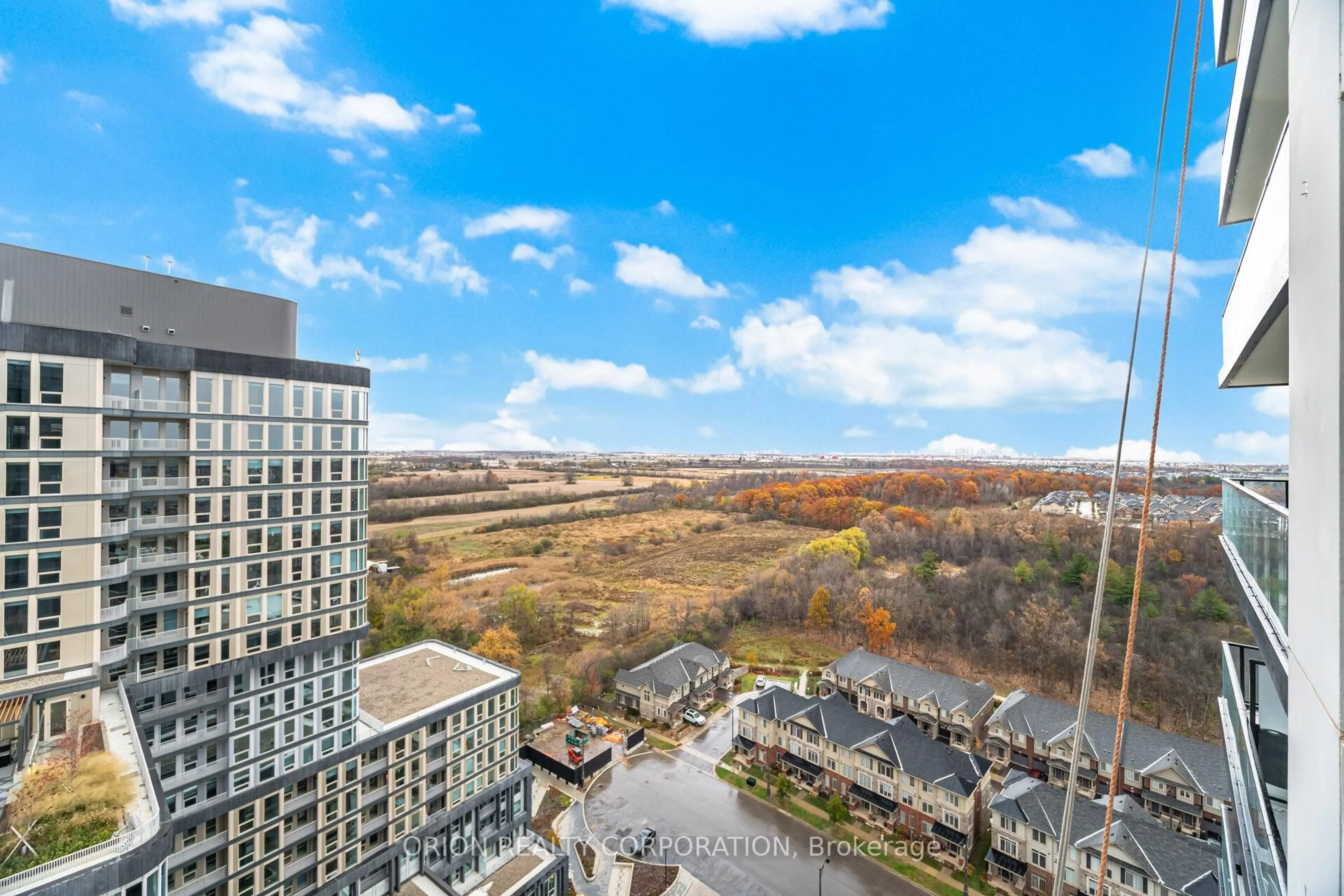 A pic from outside/outdoor area/front of a property/back of a property/a pic from drone, city buildings view from balcony for 3220 William Coltson Ave #1906, Oakville Ontario L6H 7X9