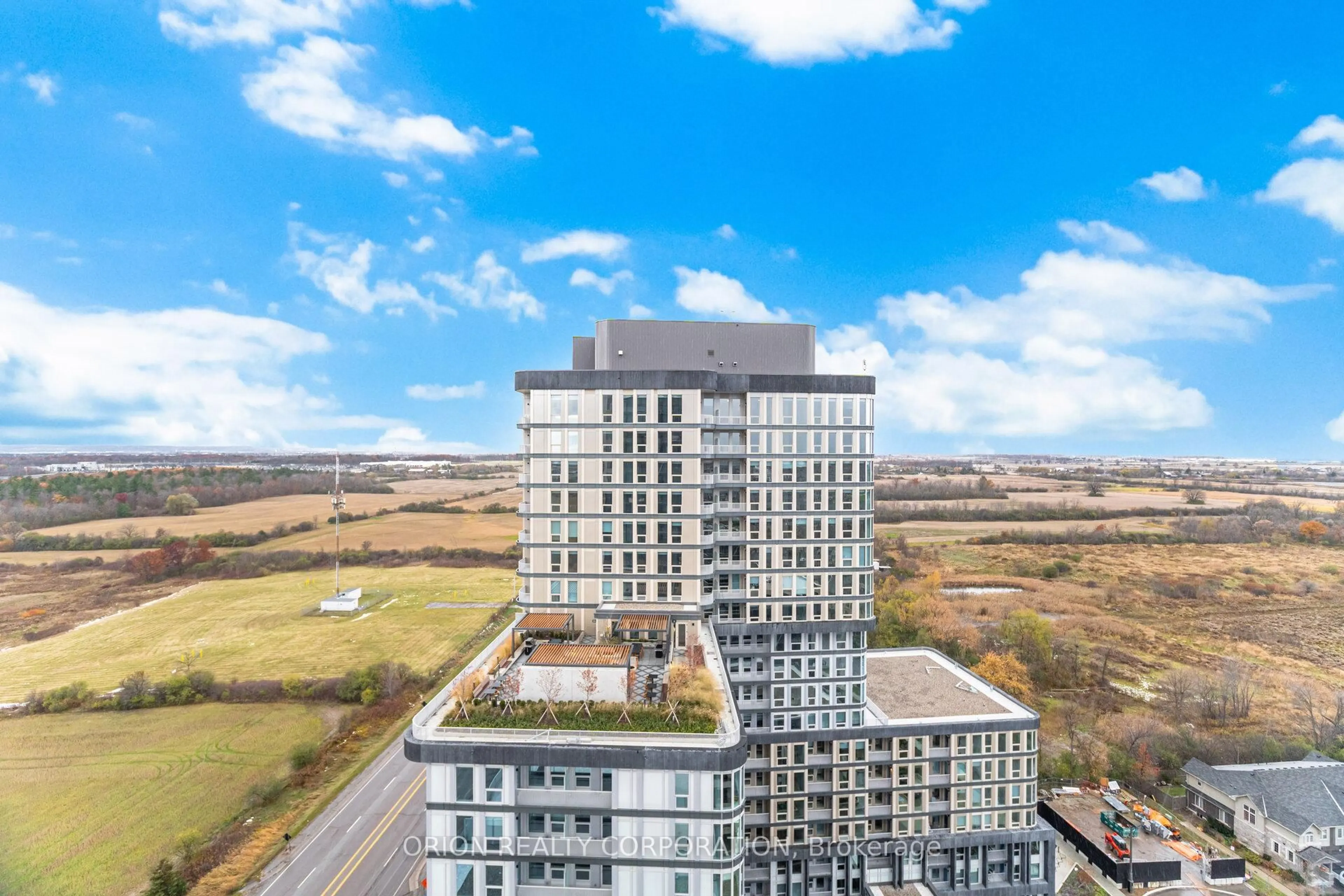 A pic from outside/outdoor area/front of a property/back of a property/a pic from drone, city buildings view from balcony for 3220 William Coltson Ave #1906, Oakville Ontario L6H 7X9