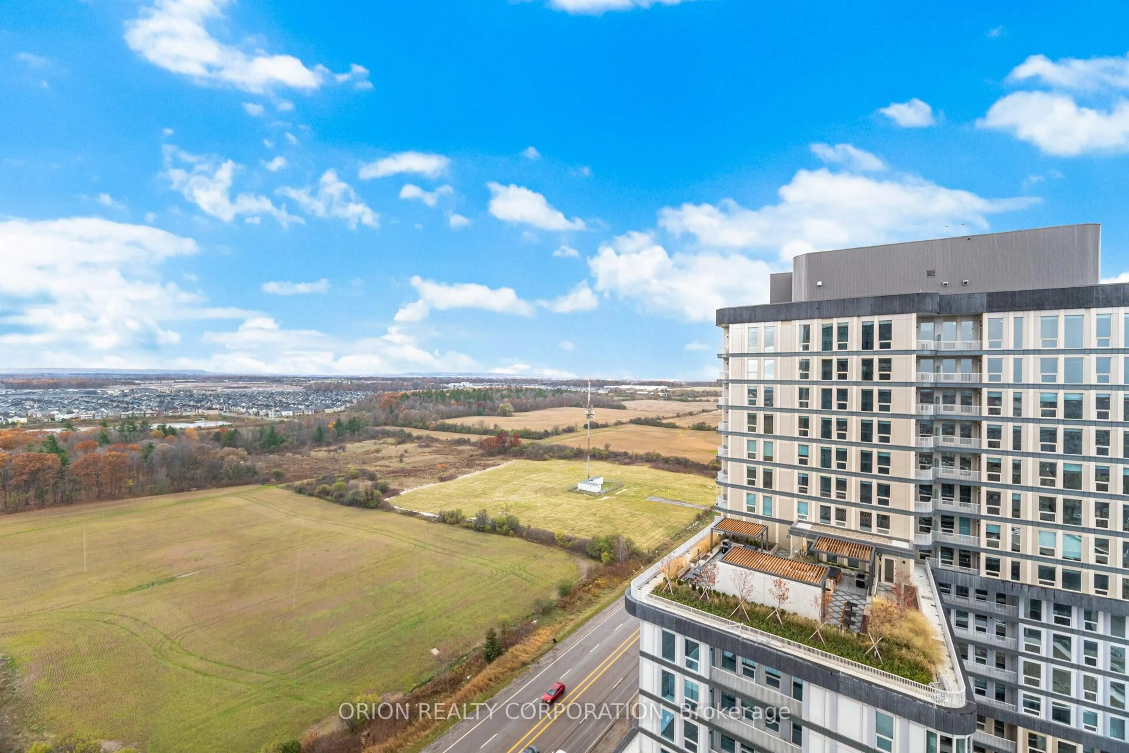 A pic from outside/outdoor area/front of a property/back of a property/a pic from drone, city buildings view from balcony for 3220 William Coltson Ave #1906, Oakville Ontario L6H 7X9