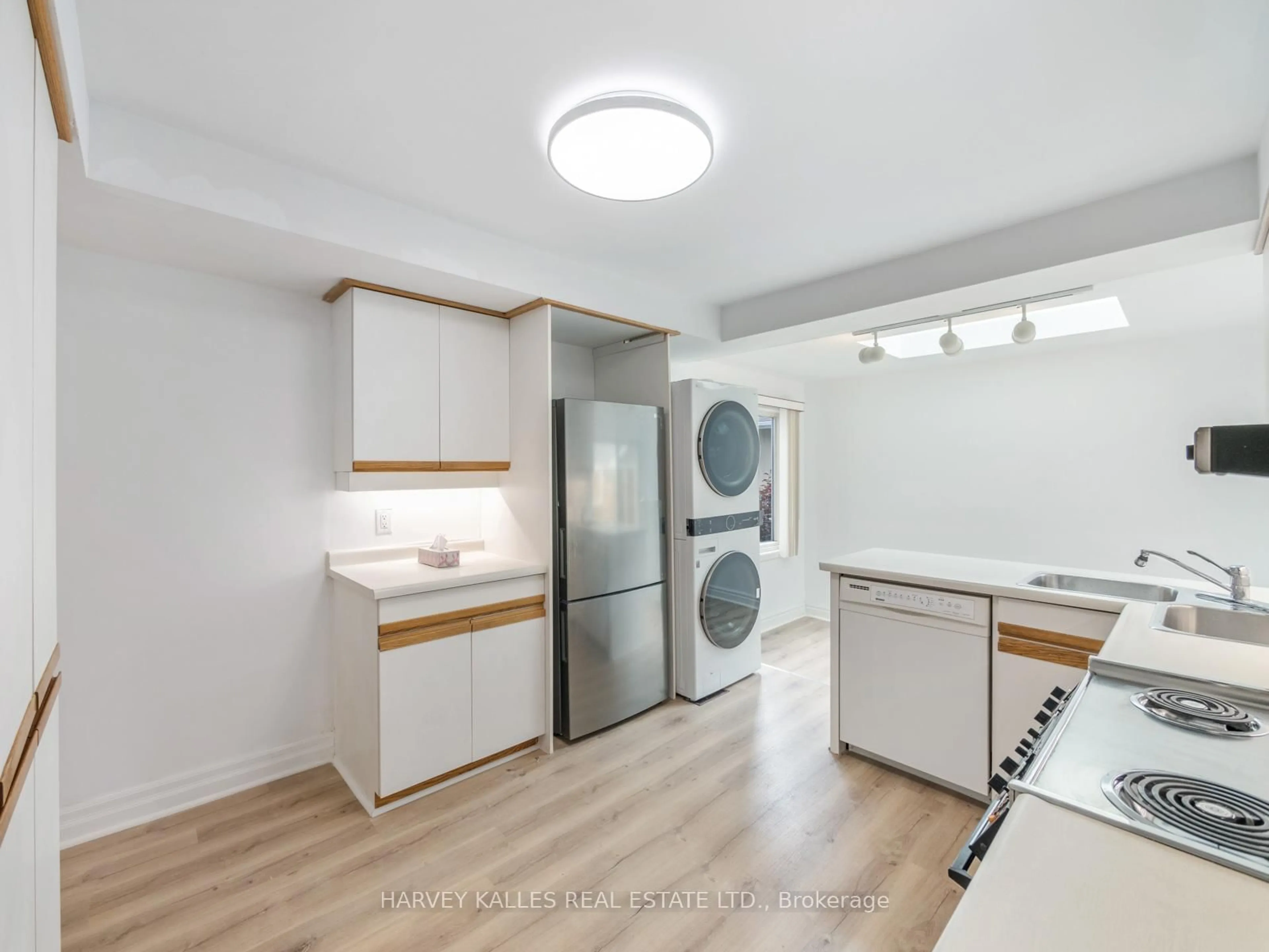 Kitchen with laundary machines, unknown for 12 Gibson Ave, Toronto Ontario M9V 2S6