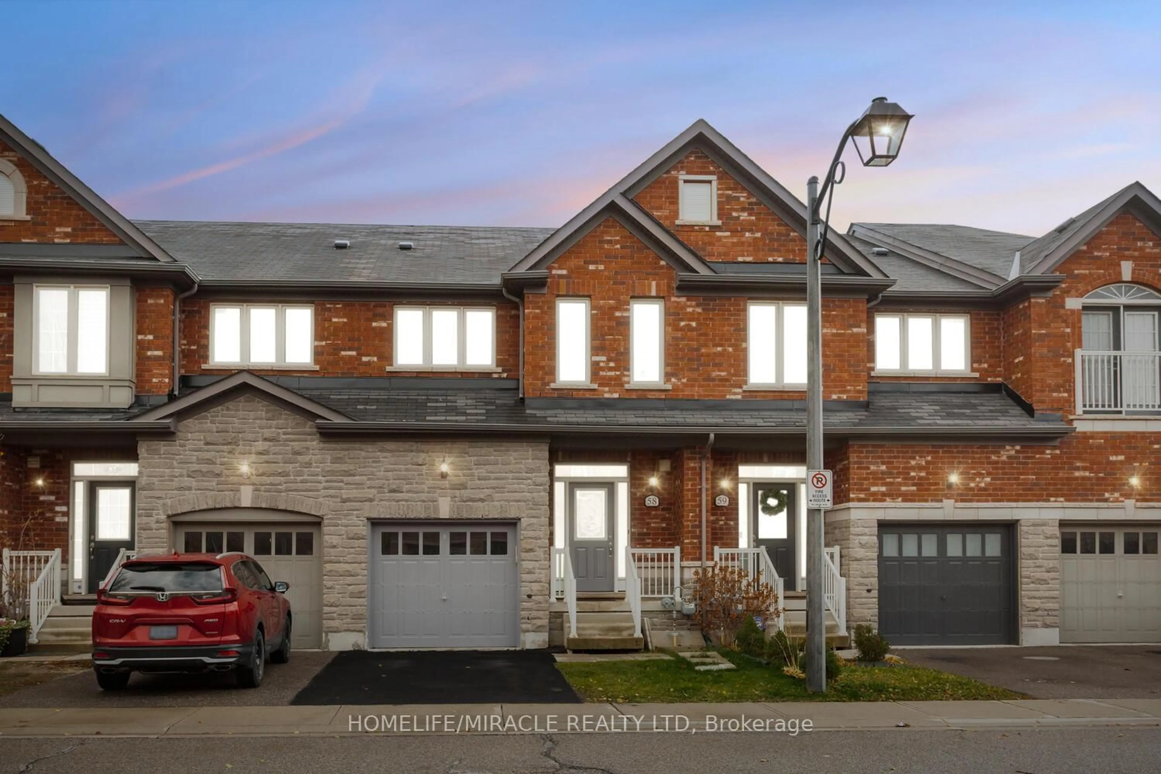Home with brick exterior material, street for 745 Farmstead Dr #58, Milton Ontario L9T 8B2