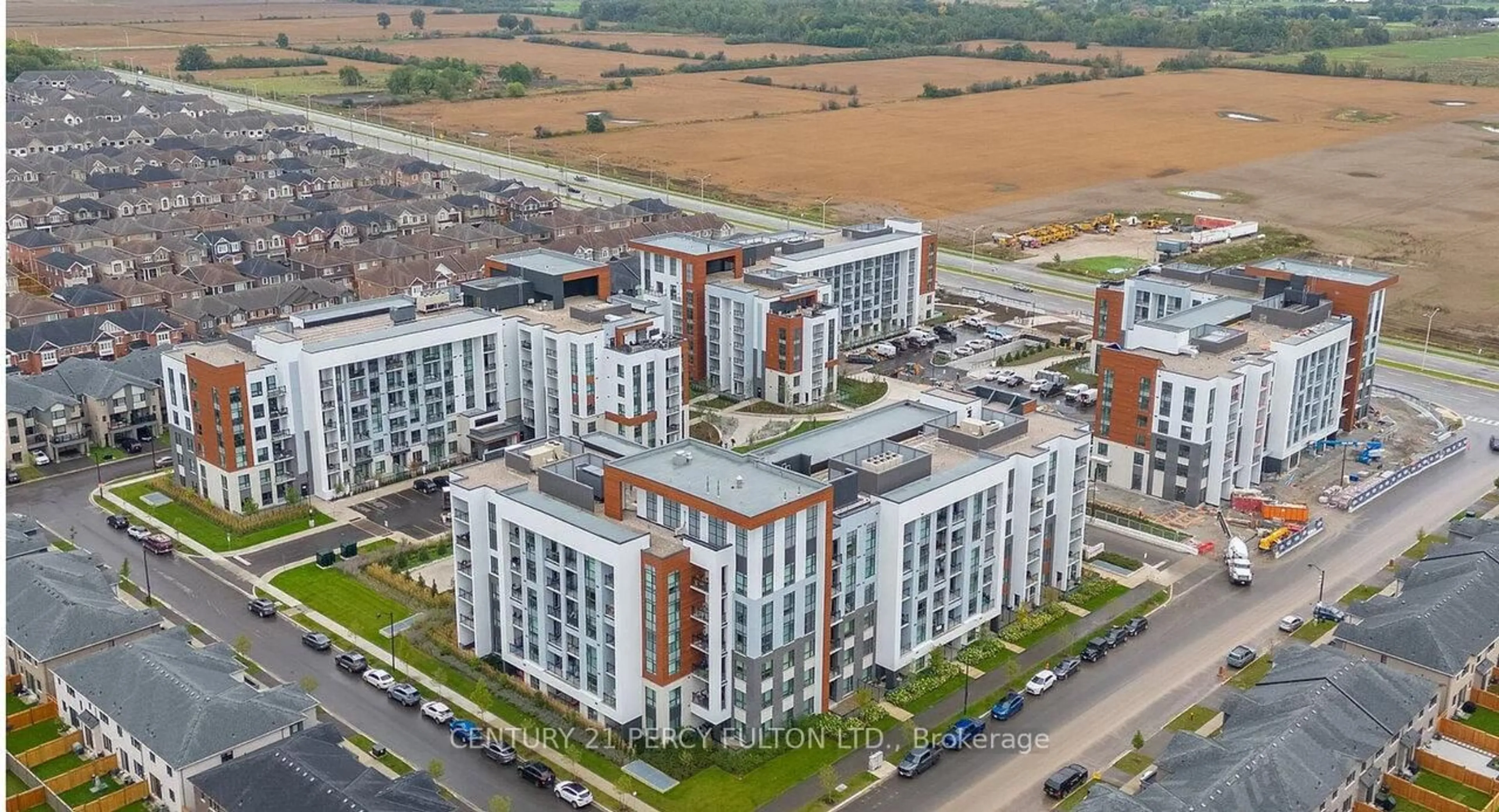 A pic from outside/outdoor area/front of a property/back of a property/a pic from drone, city buildings view from balcony for 470 Gordon Krantz Ave #112, Milton Ontario L9E 1Z3