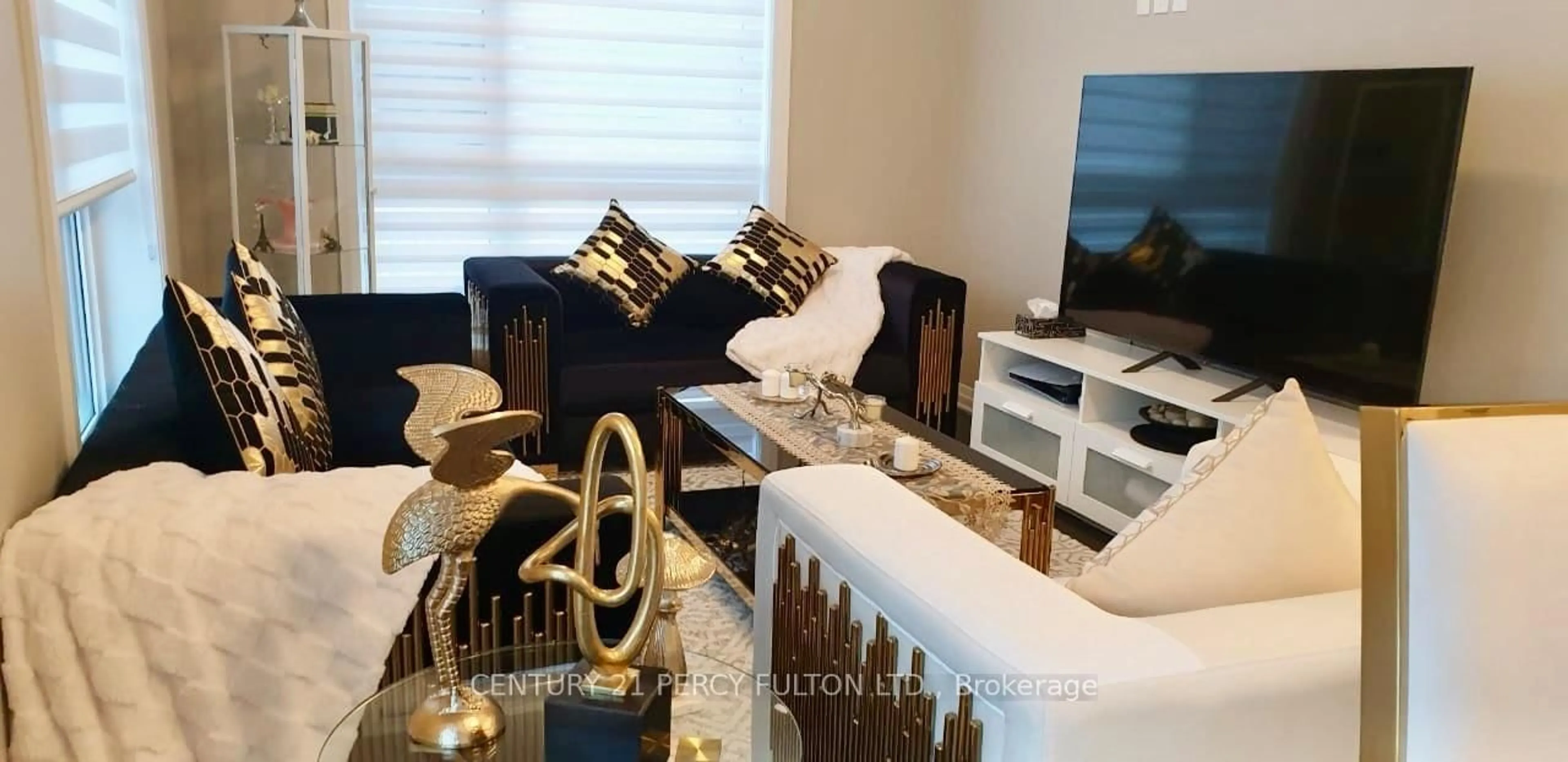 Living room with furniture, wood/laminate floor for 470 Gordon Krantz Ave #112, Milton Ontario L9E 1Z3