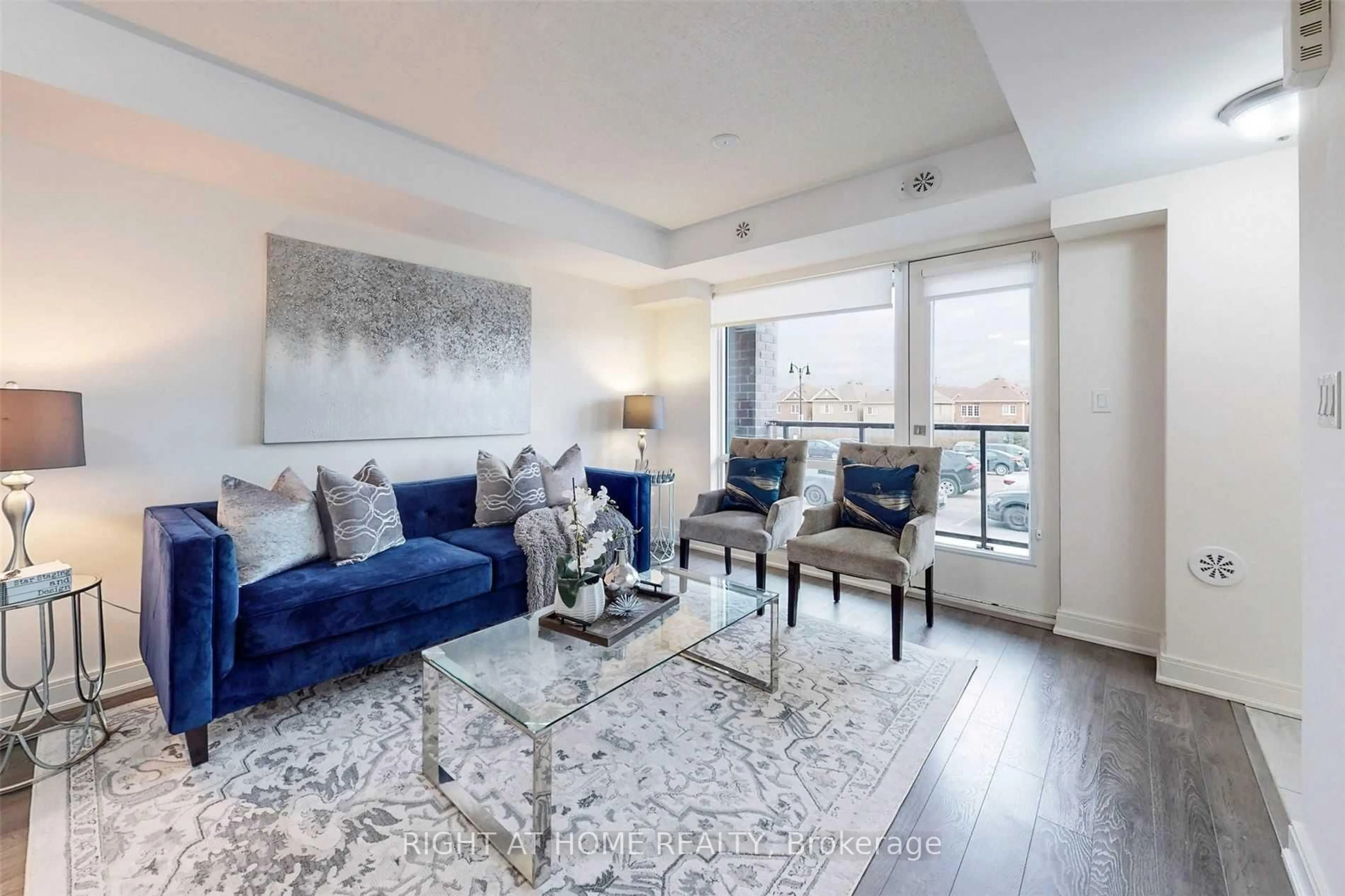 Living room with furniture, unknown for 100 Dufay Rd #82, Brampton Ontario L7A 4S3