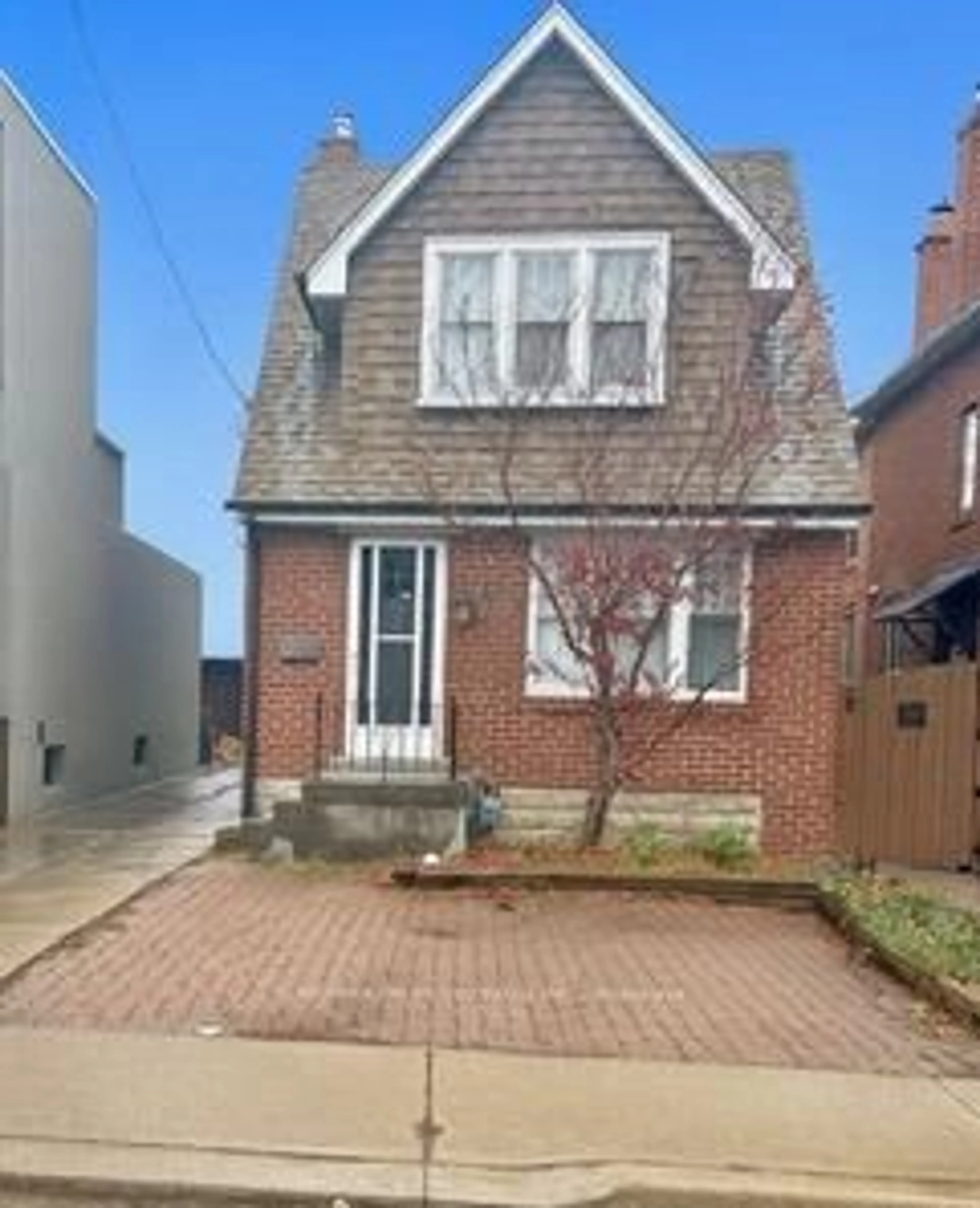 Home with brick exterior material, street for 40 Warren Cres, Toronto Ontario M6S 4S2
