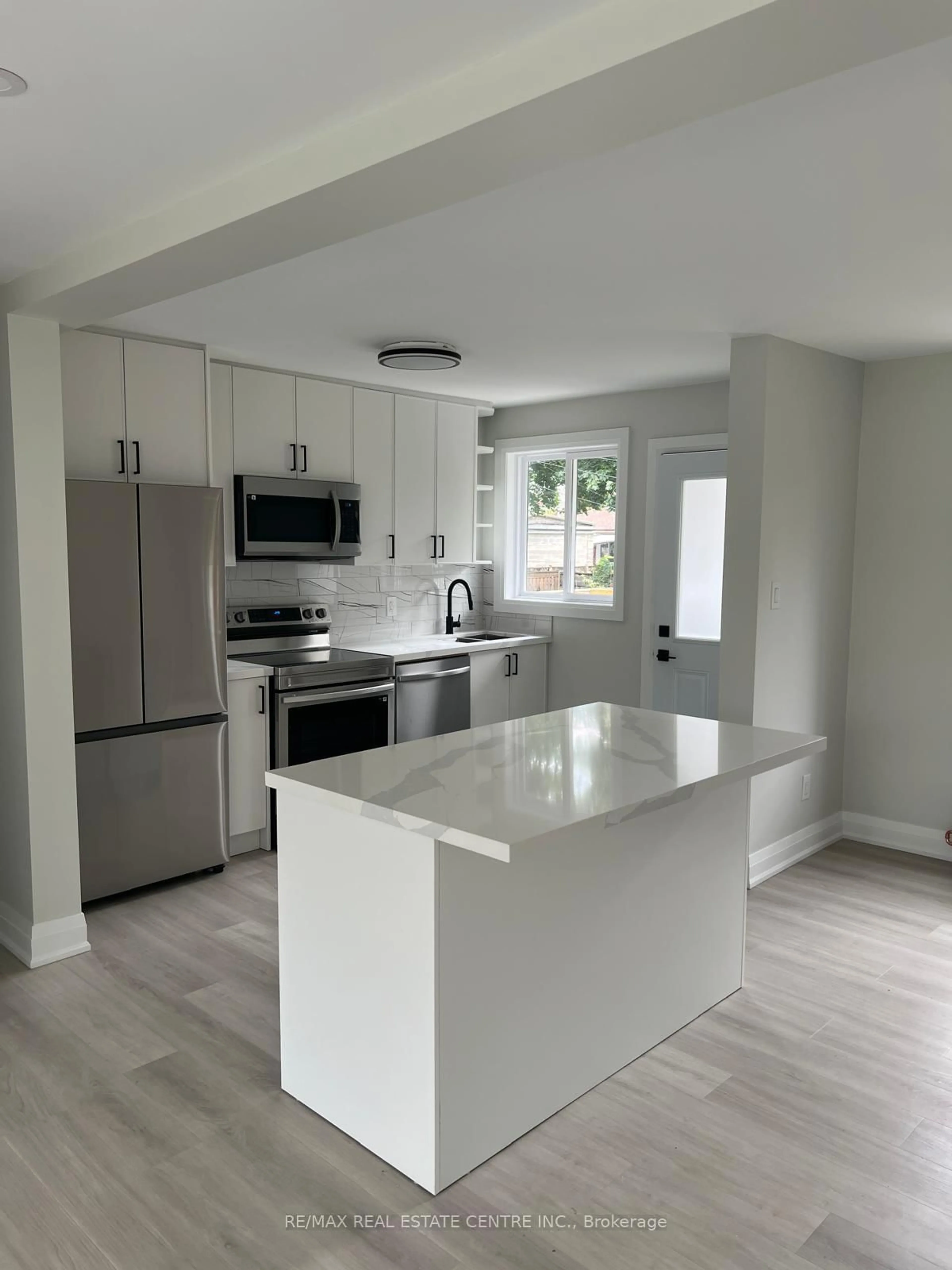 Open concept kitchen, unknown for 255 Gamma St, Toronto Ontario M8W 4G9