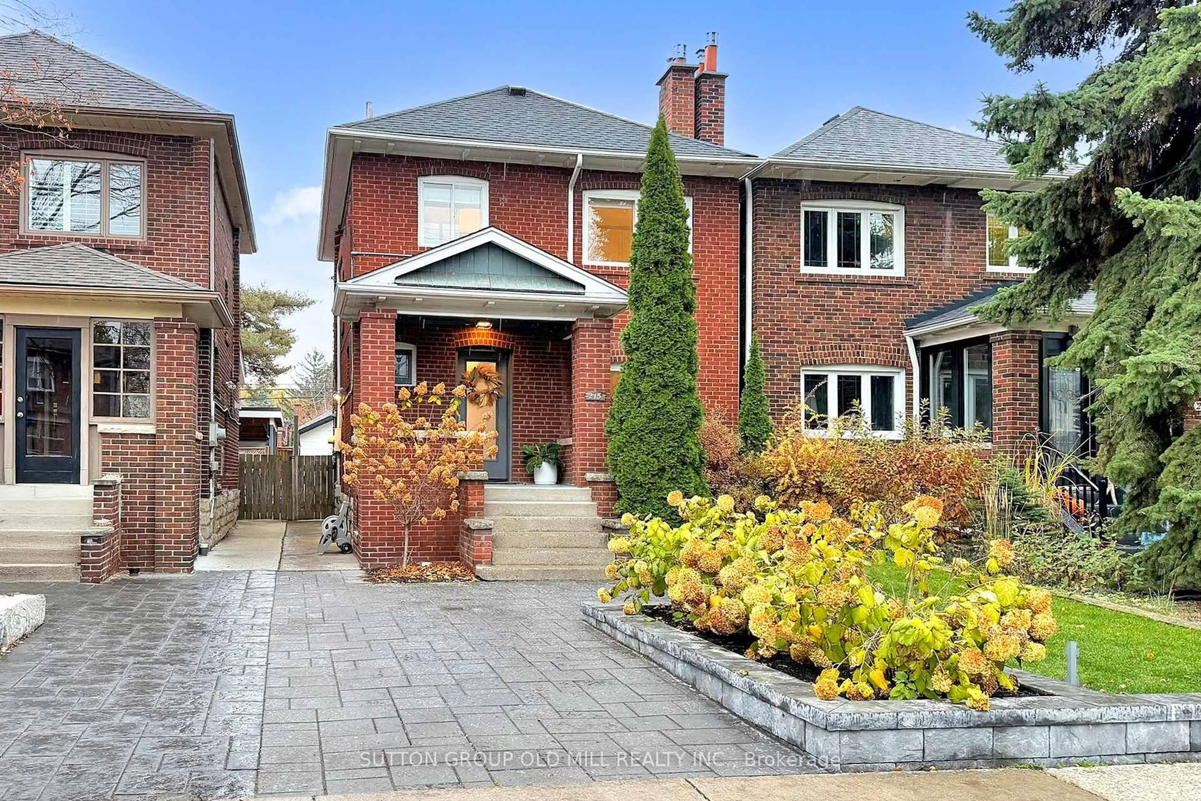 Home with brick exterior material, street for 215 Humbercrest Blvd, Toronto Ontario M6S 4L5