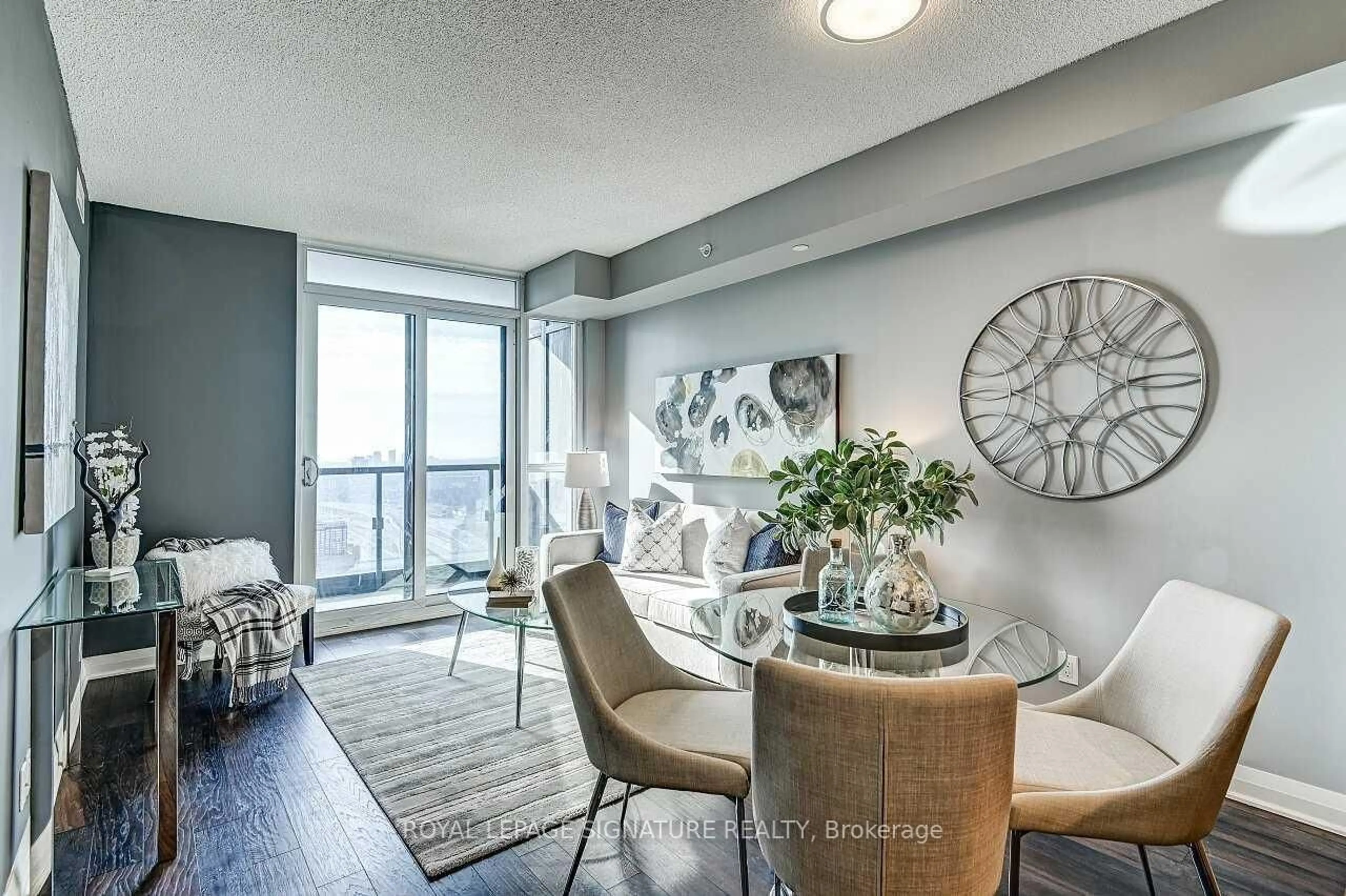 Living room with furniture, wood/laminate floor for 5 Valhalla Inn Rd #2405, Toronto Ontario M9B 0B1