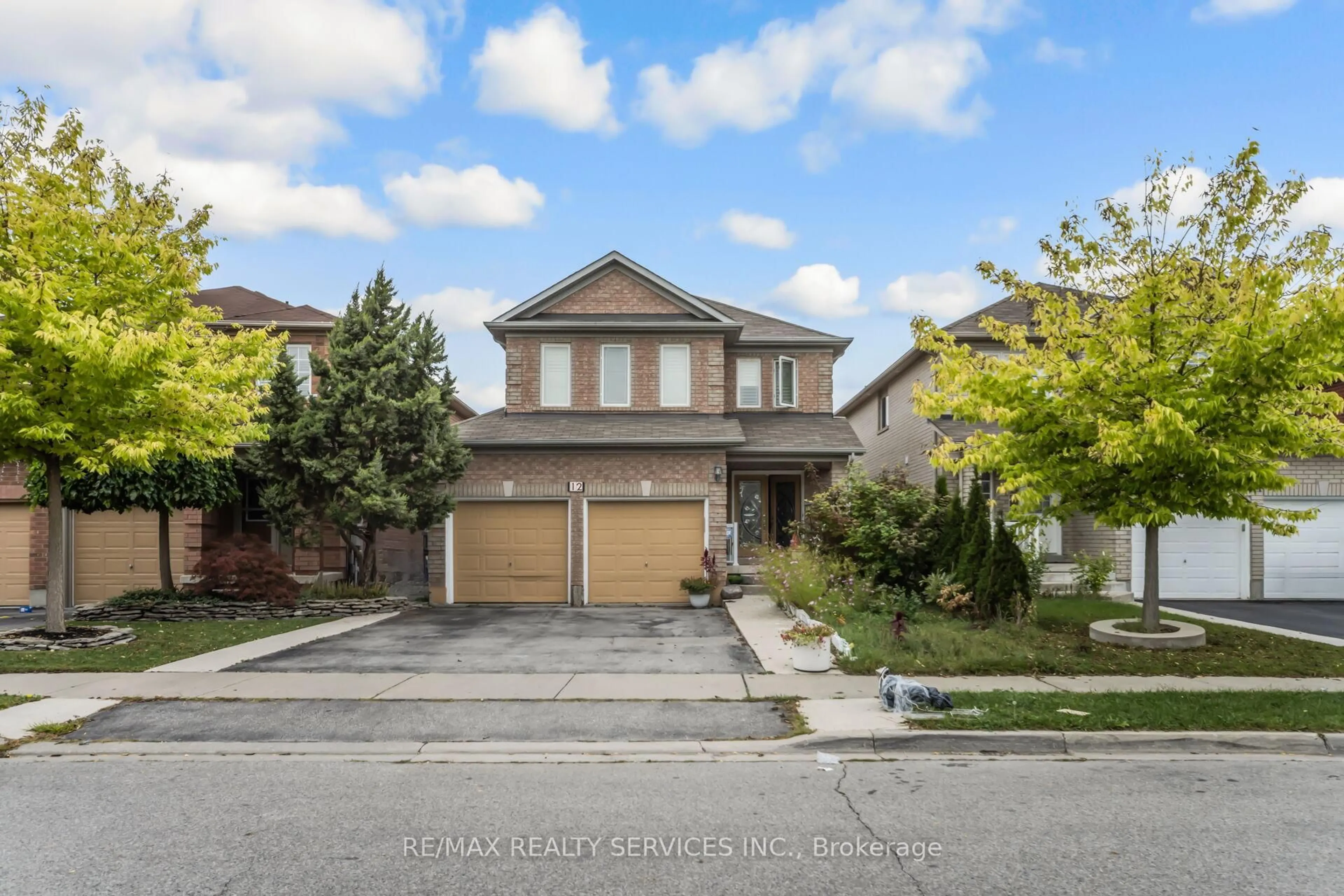 A pic from outside/outdoor area/front of a property/back of a property/a pic from drone, street for 12 Roadmaster Lane, Brampton Ontario L7A 3A9