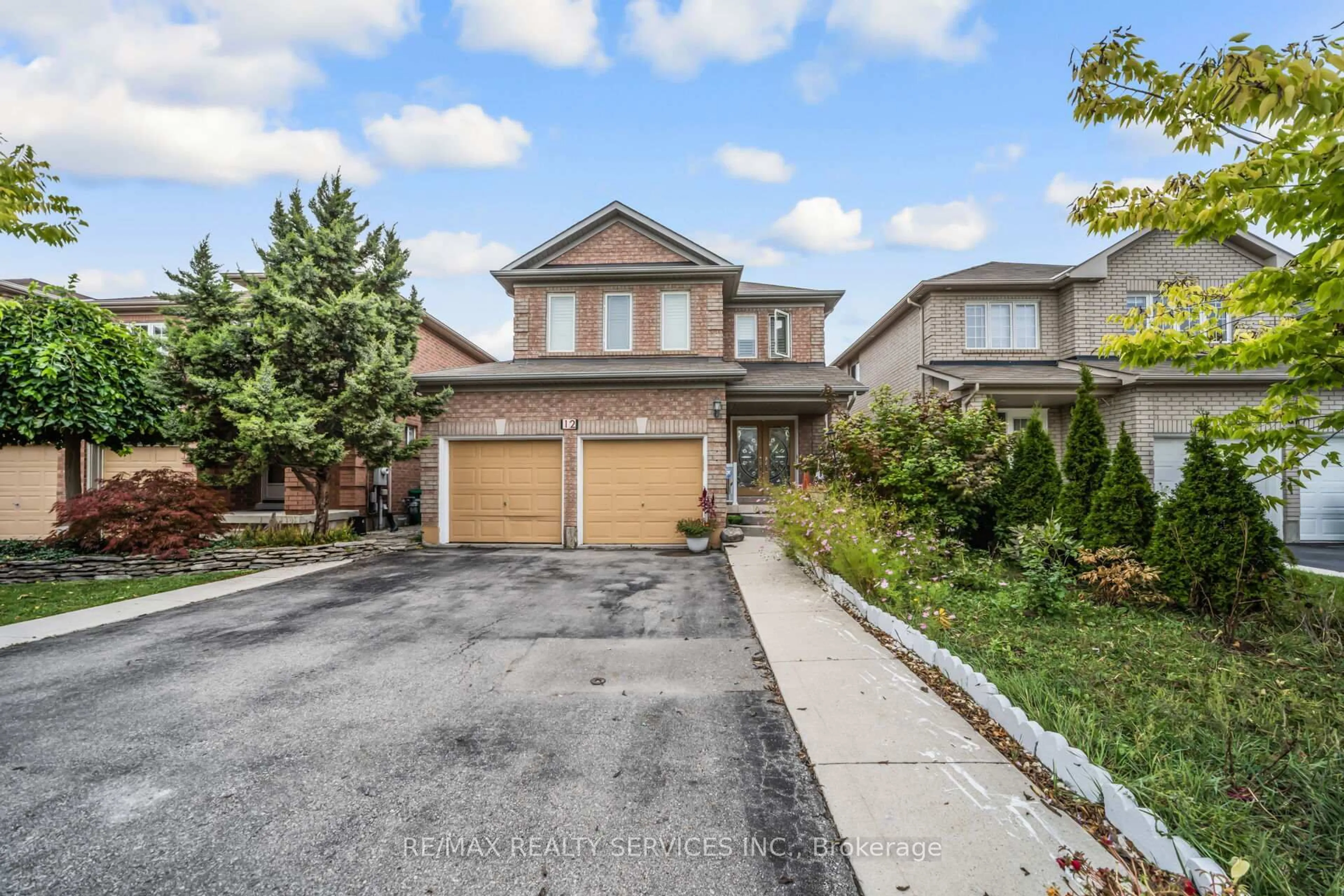 A pic from outside/outdoor area/front of a property/back of a property/a pic from drone, street for 12 Roadmaster Lane, Brampton Ontario L7A 3A9