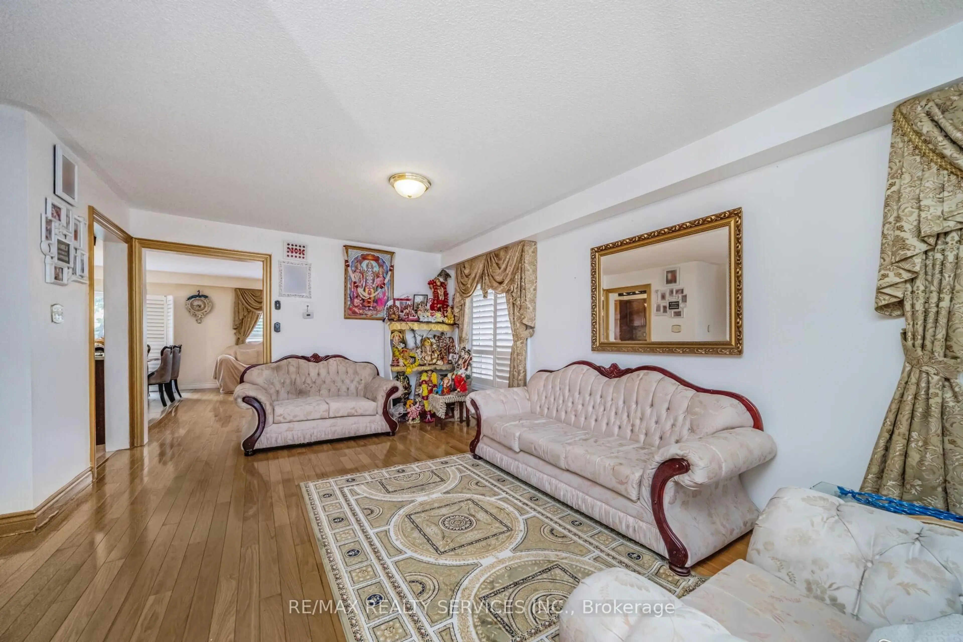 Living room with furniture, unknown for 12 Roadmaster Lane, Brampton Ontario L7A 3A9