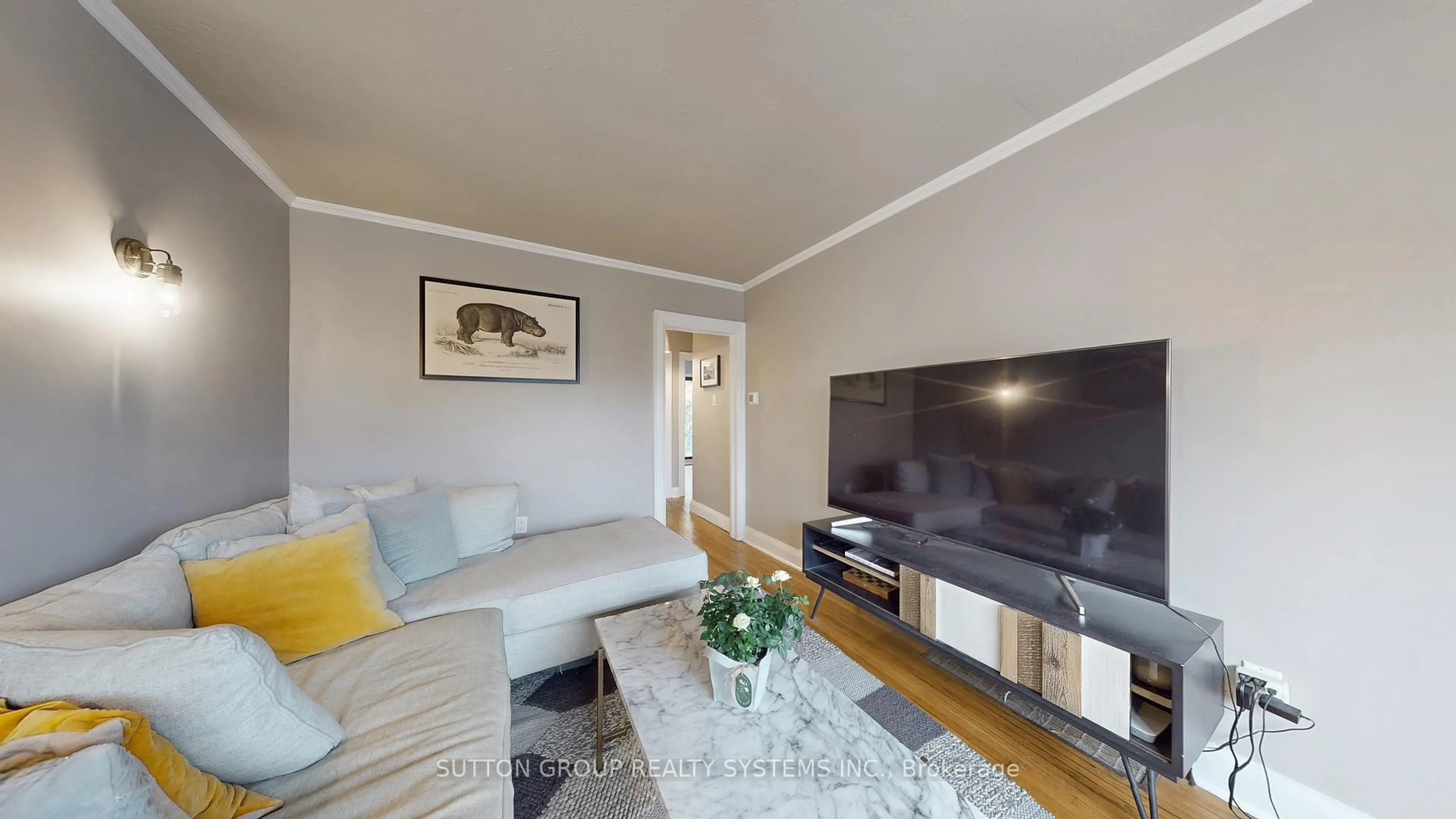 Living room with furniture, wood/laminate floor for 51 Juliet Cres, Toronto Ontario M6M 1N5