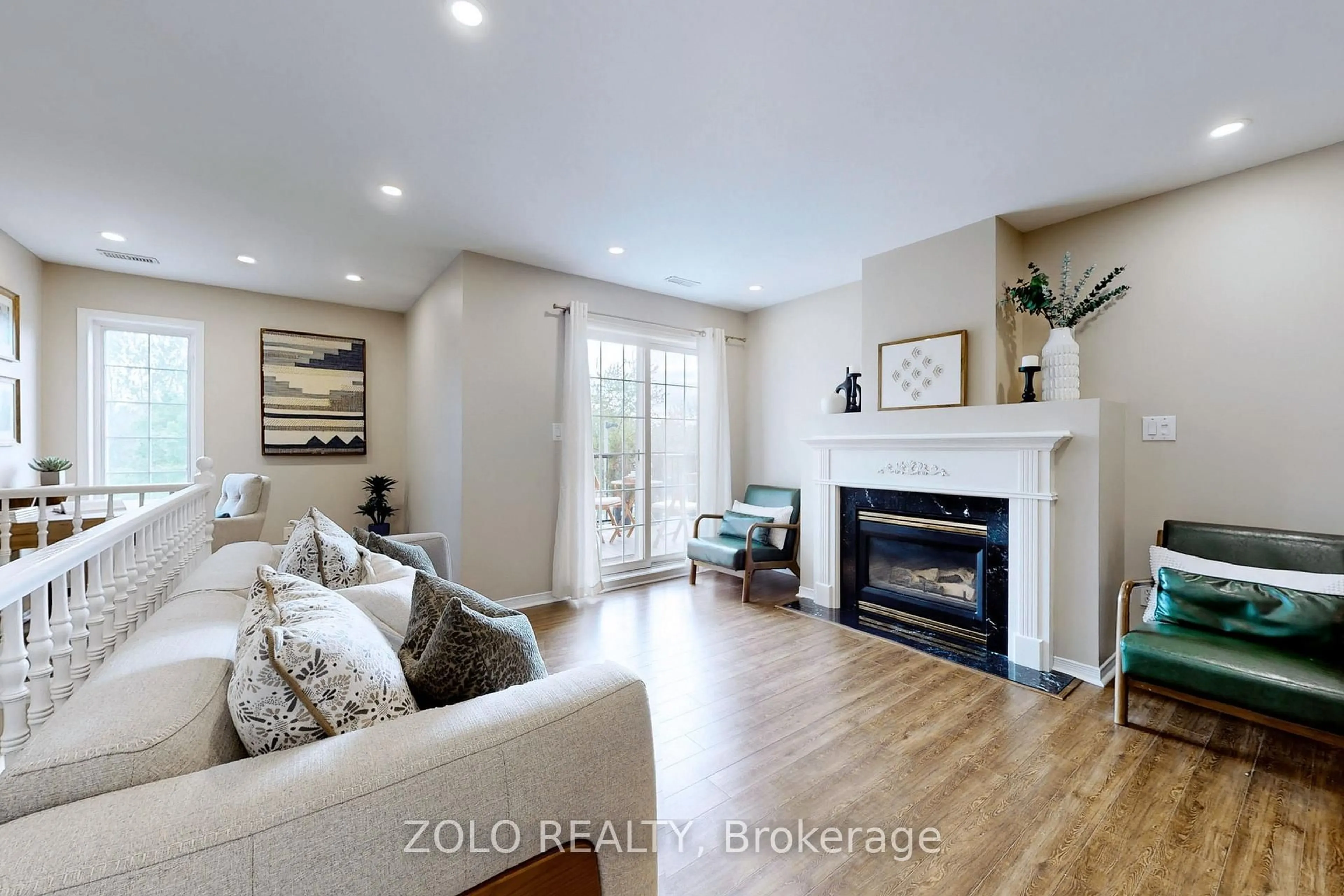 Living room with furniture, wood/laminate floor for 2333 Walker's Line #2, Burlington Ontario L7M 4T1