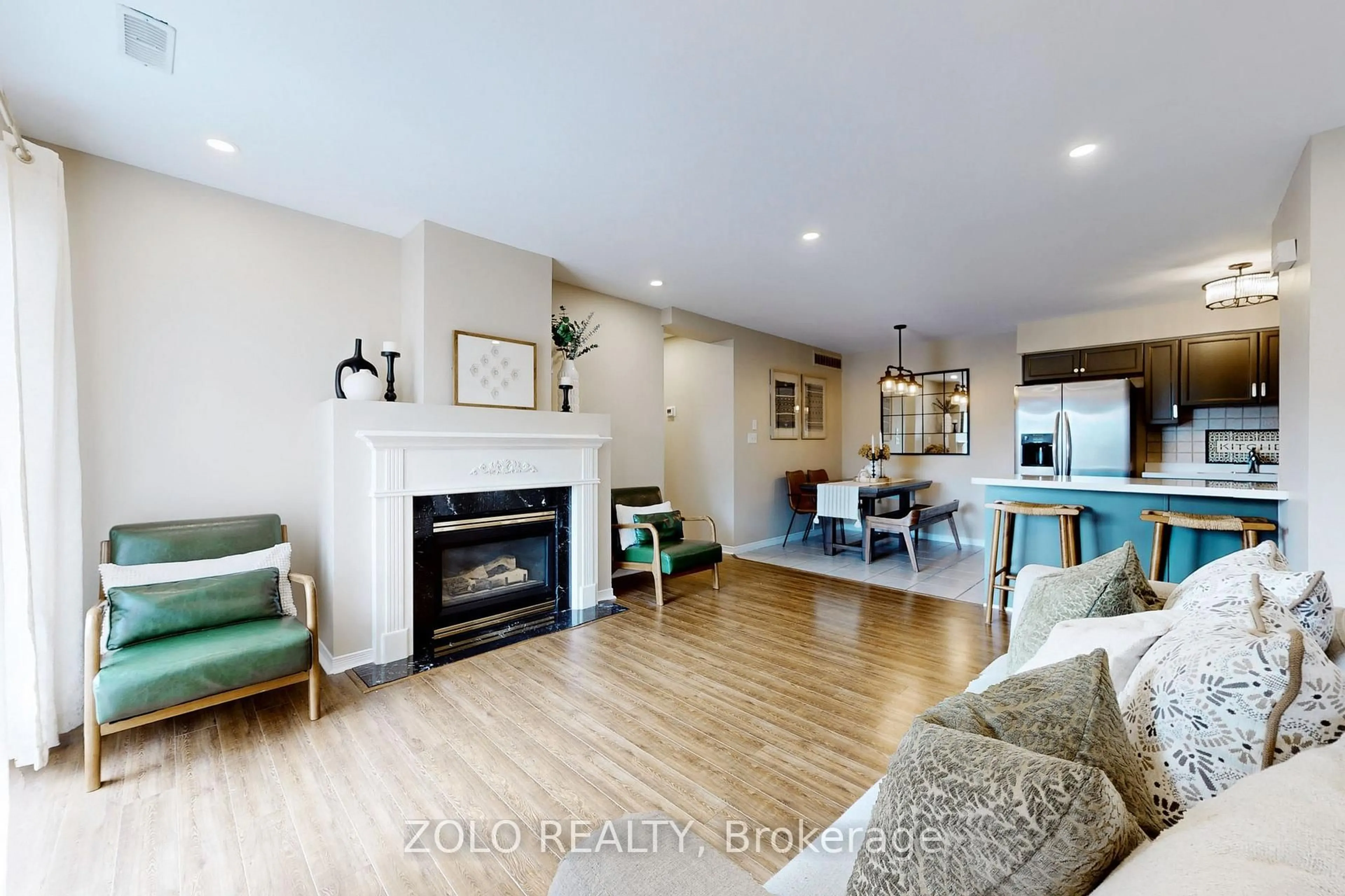 Open concept kitchen, wood/laminate floor for 2333 Walker's Line #2, Burlington Ontario L7M 4T1