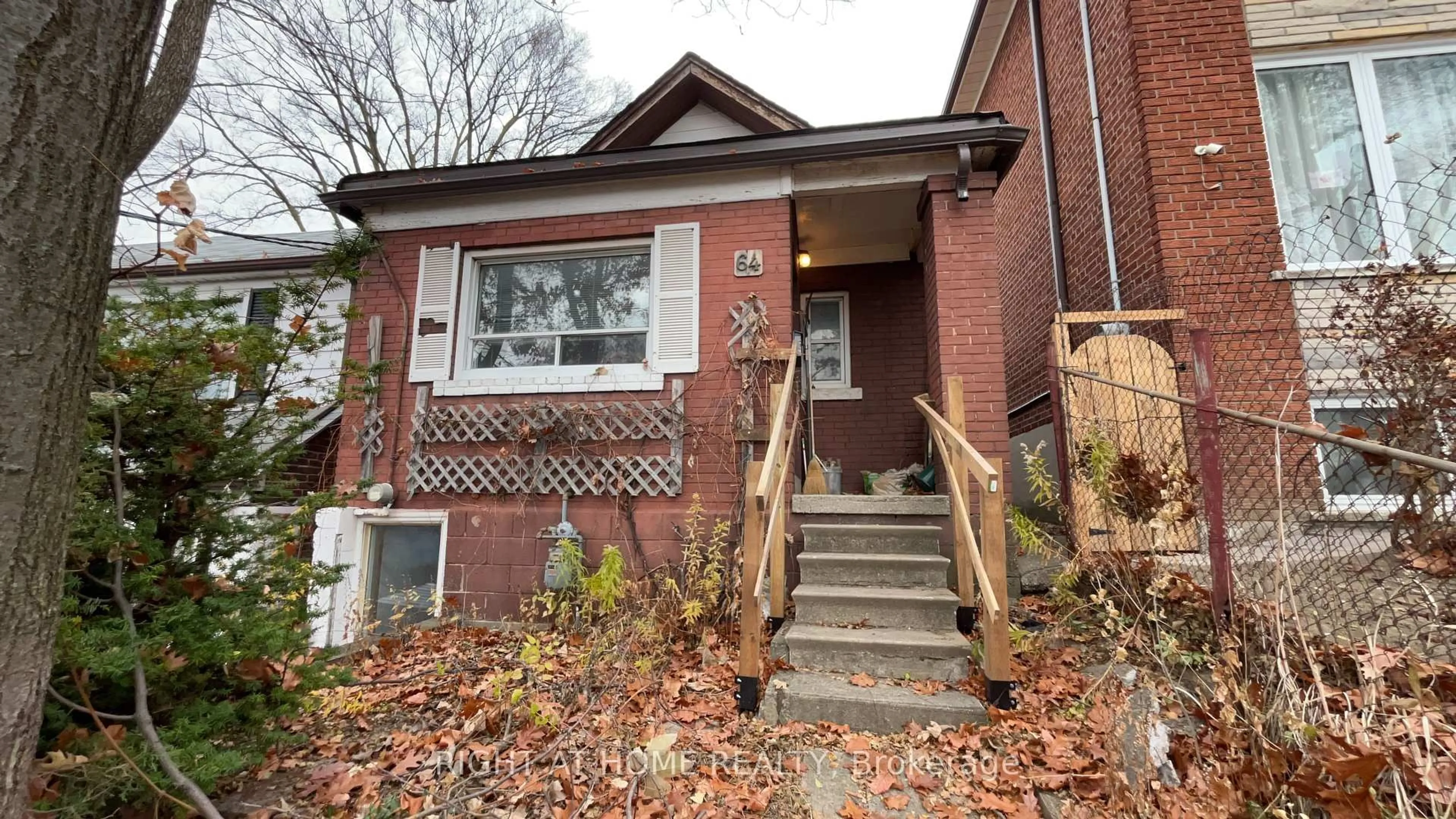Home with brick exterior material, street for 64 Donald Ave, Toronto Ontario M6M 1K3