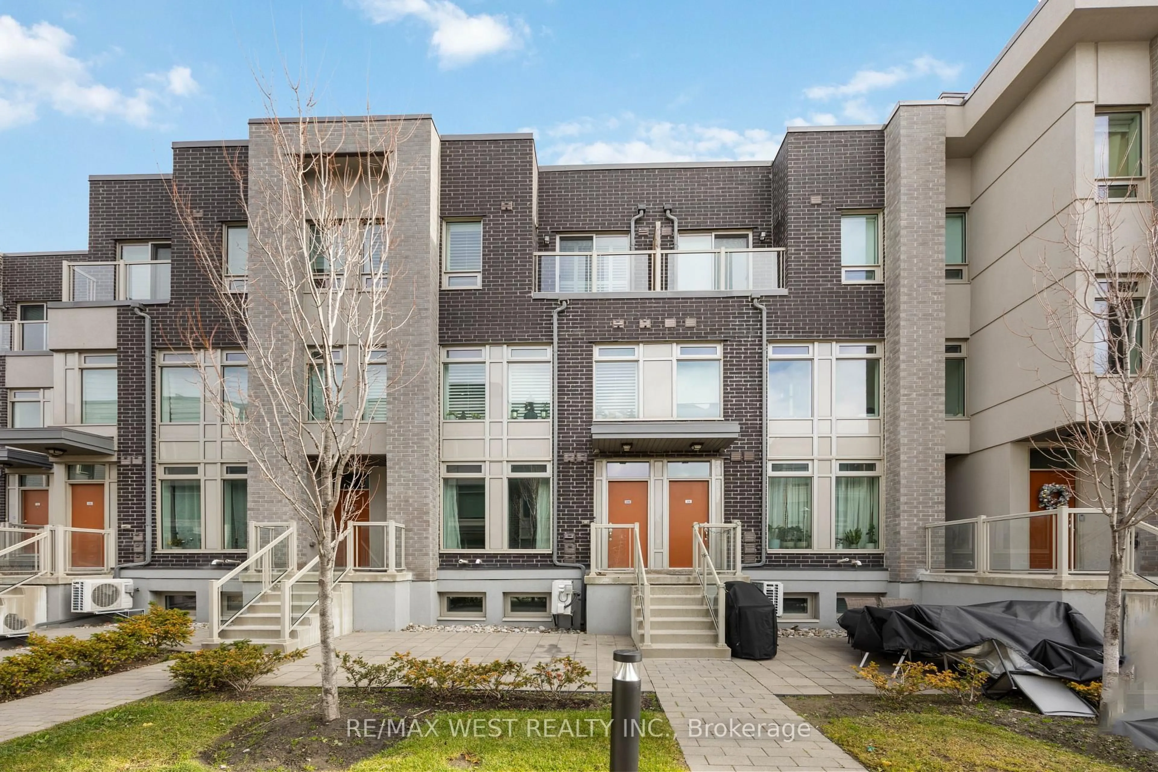 Home with brick exterior material, street for 11 Applewood Lane #120, Toronto Ontario M9C 0C1