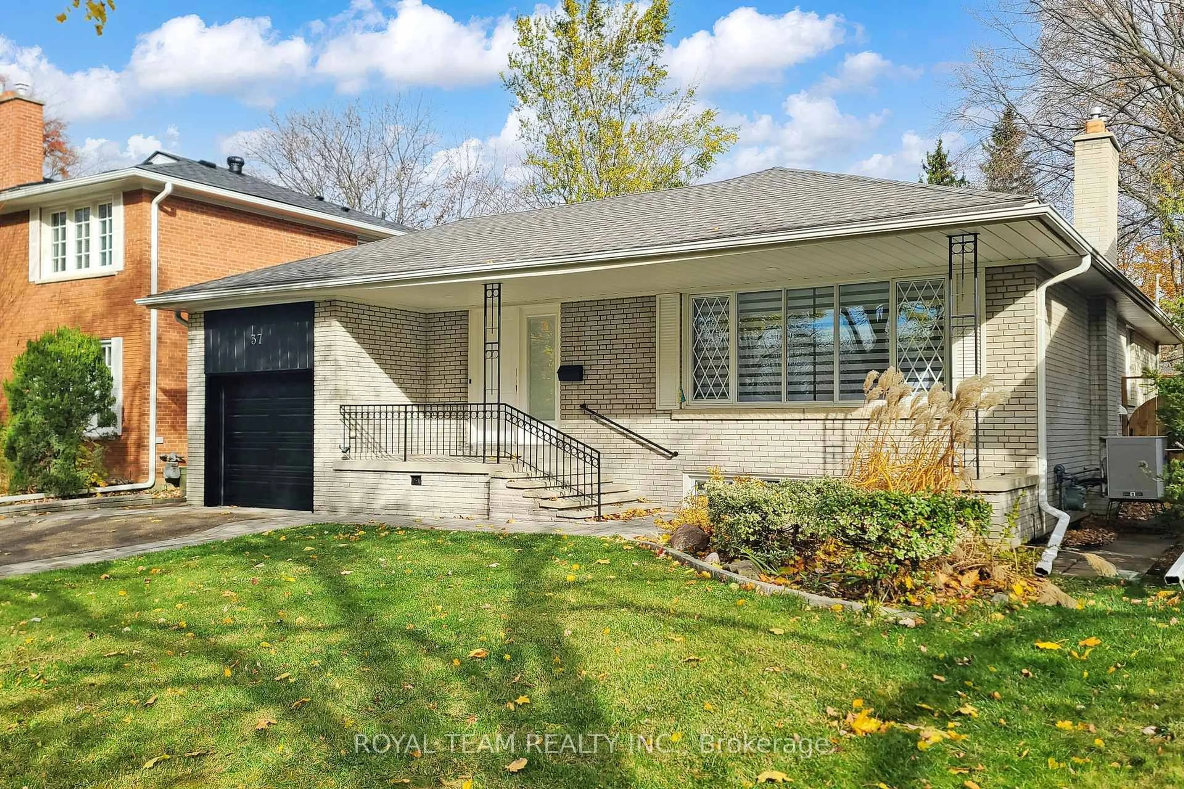 Home with brick exterior material, street for 37 Markland Dr, Toronto Ontario M9C 1M9