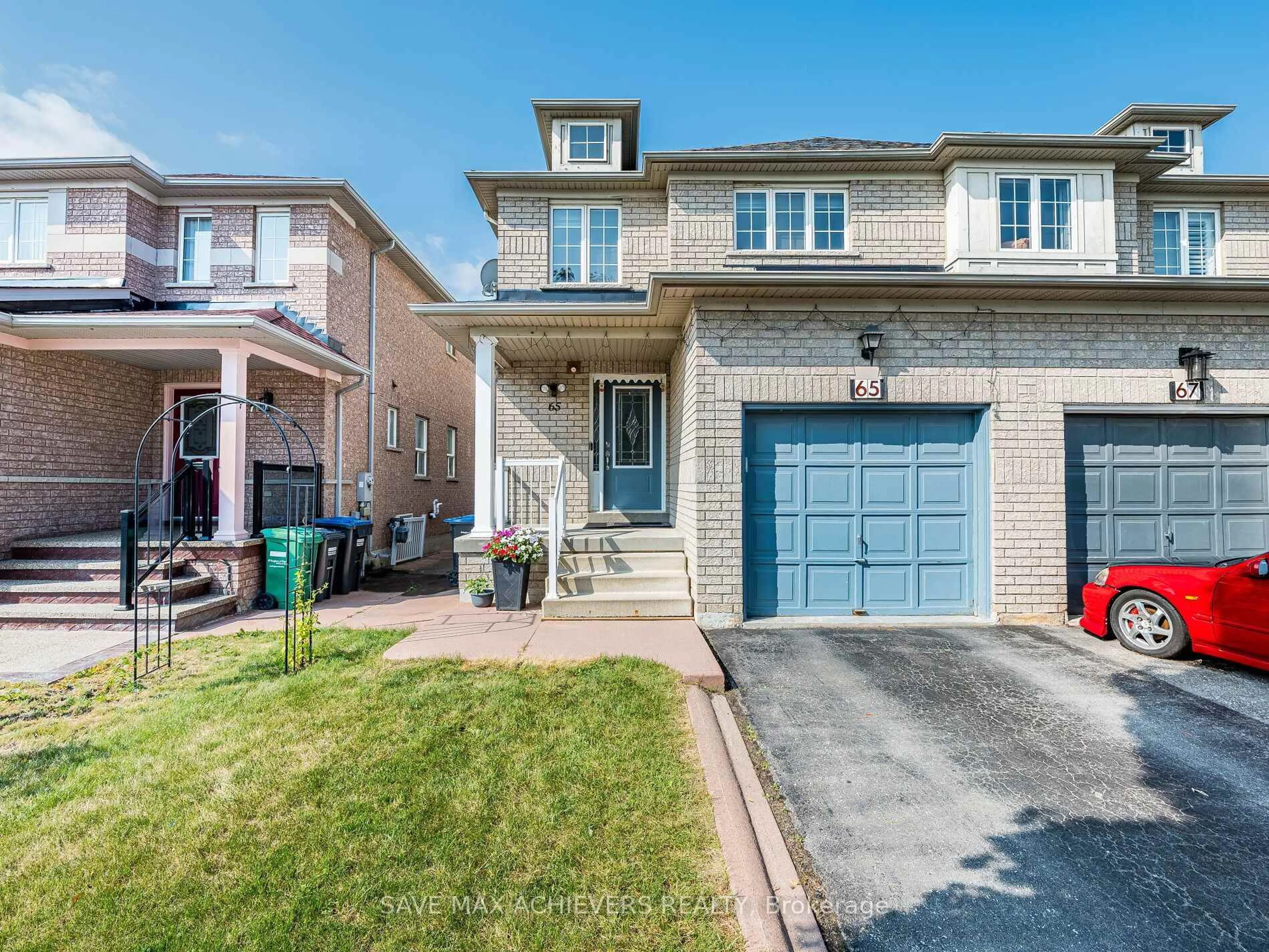 Home with brick exterior material, street for 65 Eastview Gate, Brampton Ontario L6P 1N5